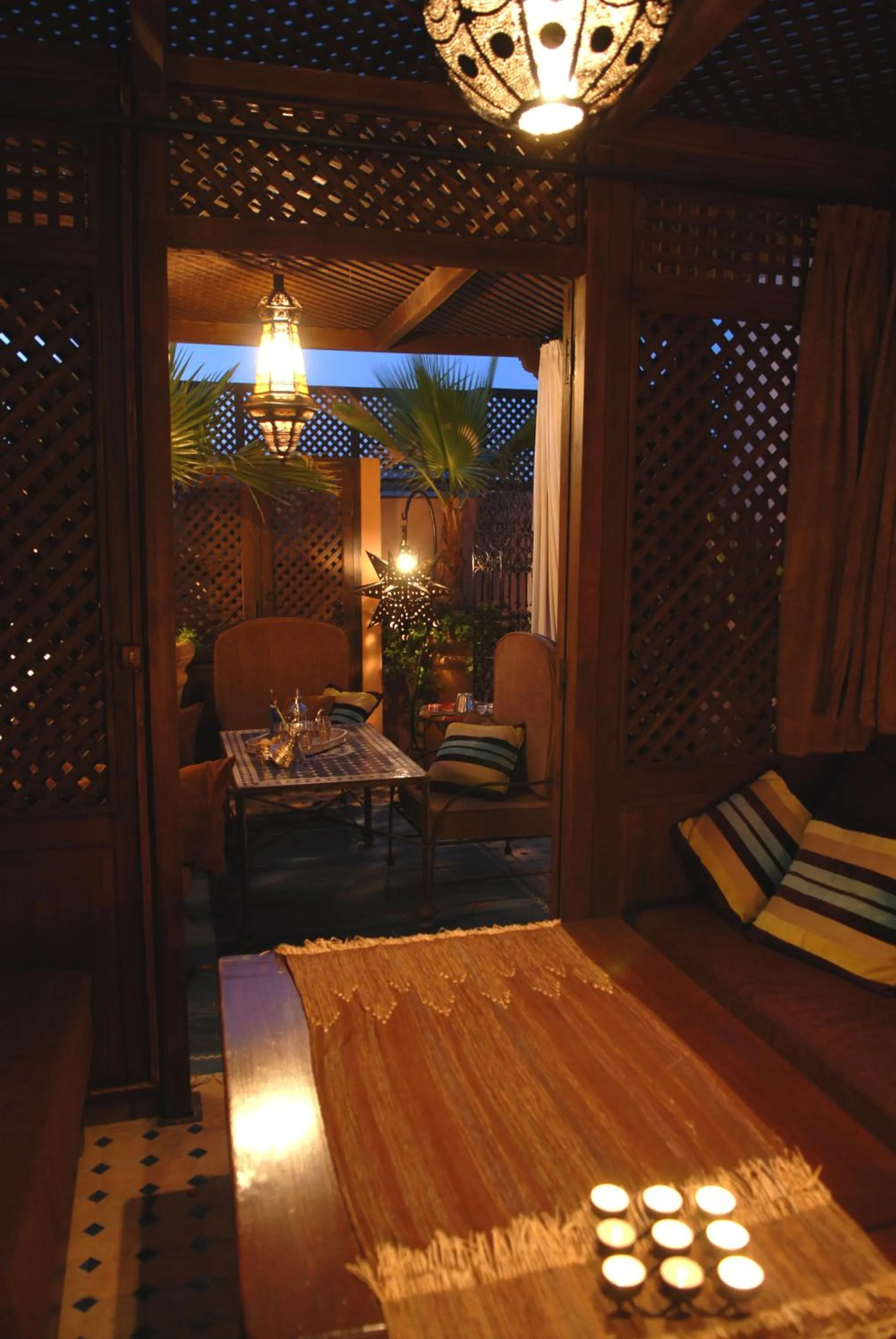 Living room, Bed in Riad Aubrac