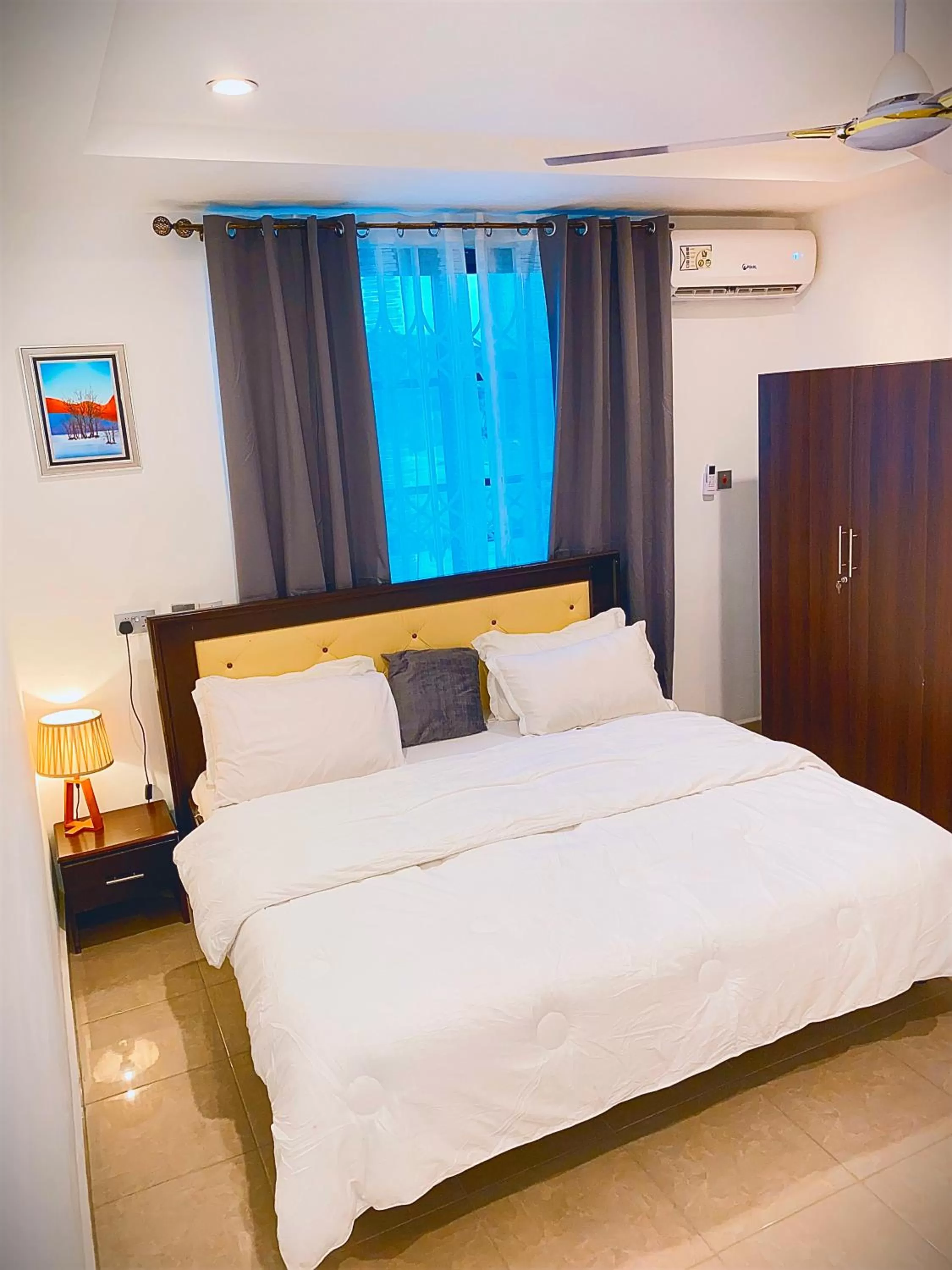 Bed in AIDEN HOMES AND APARTMENTS