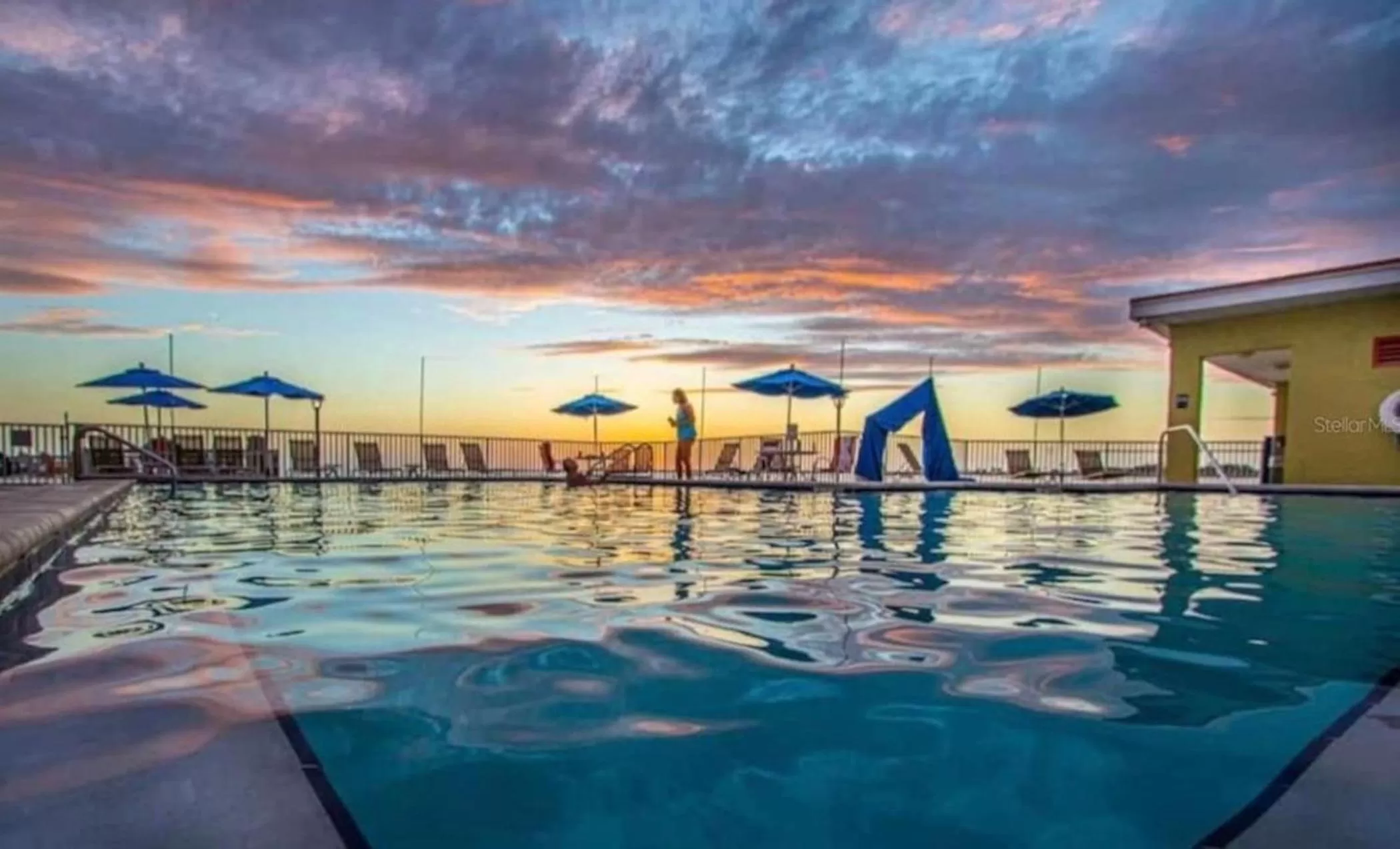 Swimming Pool in 2 Bed Condo with Balcony Facing Pool and Sunsets!