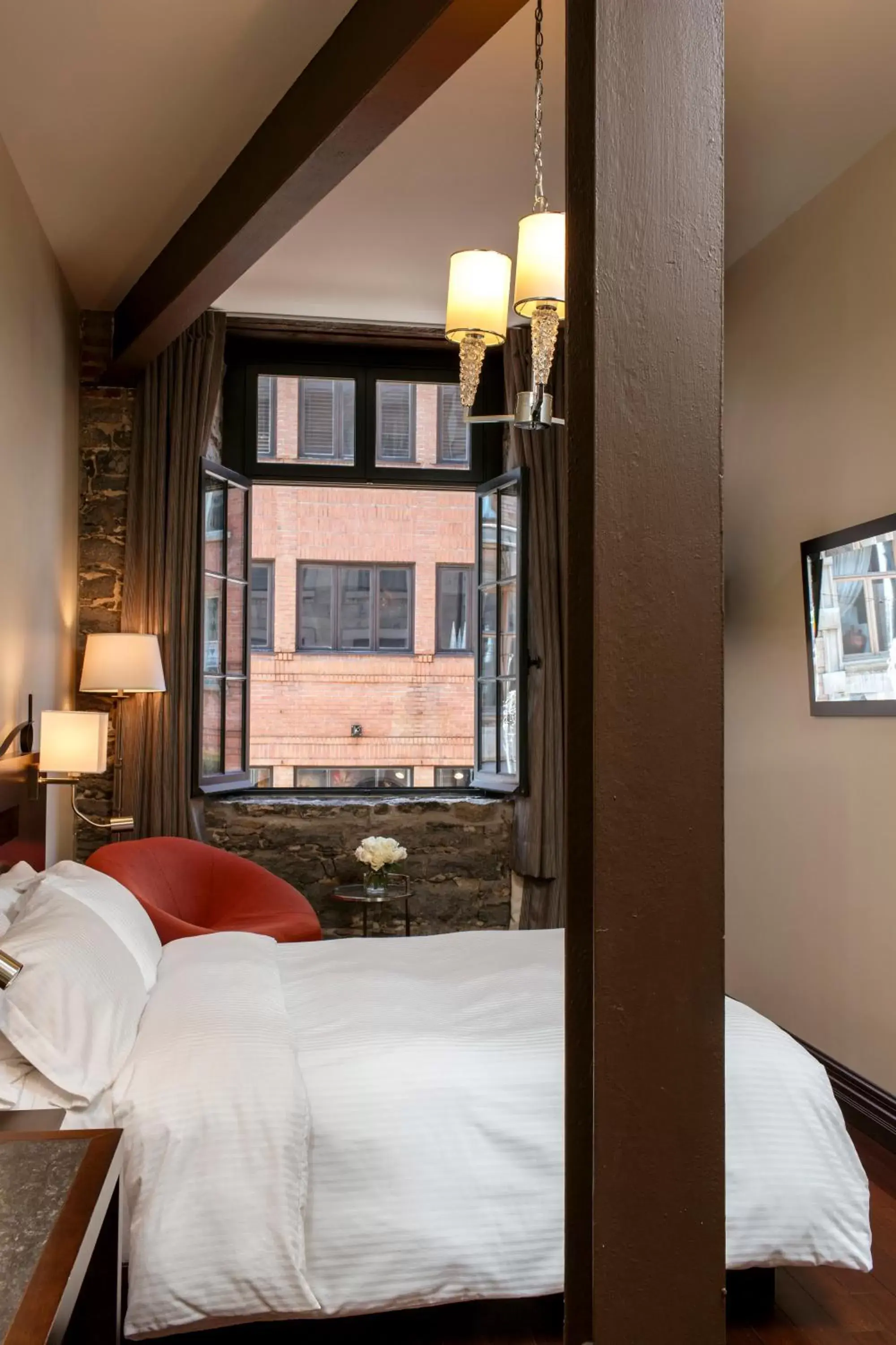 Deluxe Queen Room with St. Paul Street View in Auberge du Vieux Port by Gray Collection Deluxe Queen Room with St. Paul Street View in Auberge du Vieux Port by Gray Collection