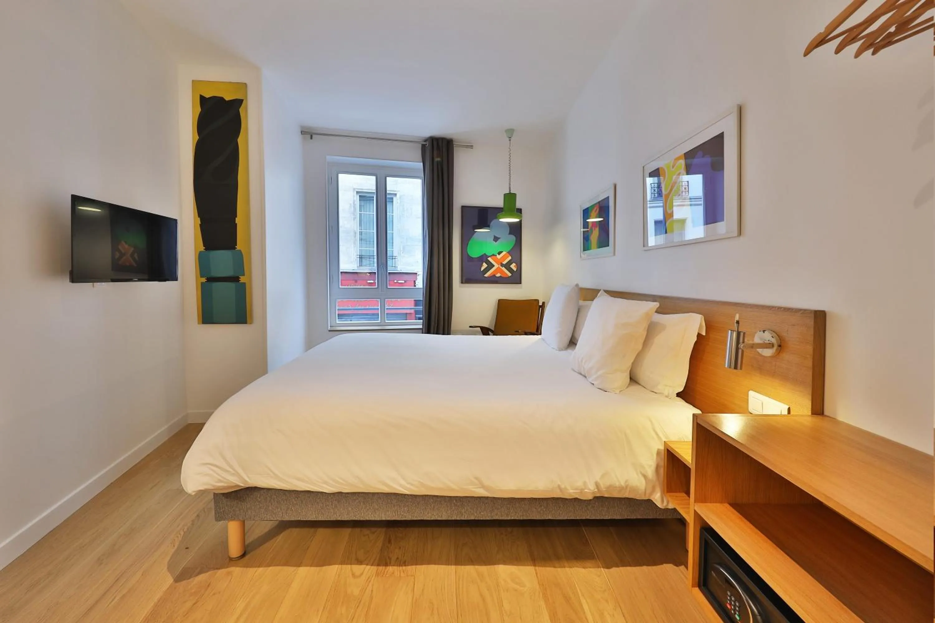 Bed in Hôtel Louvre Richelieu