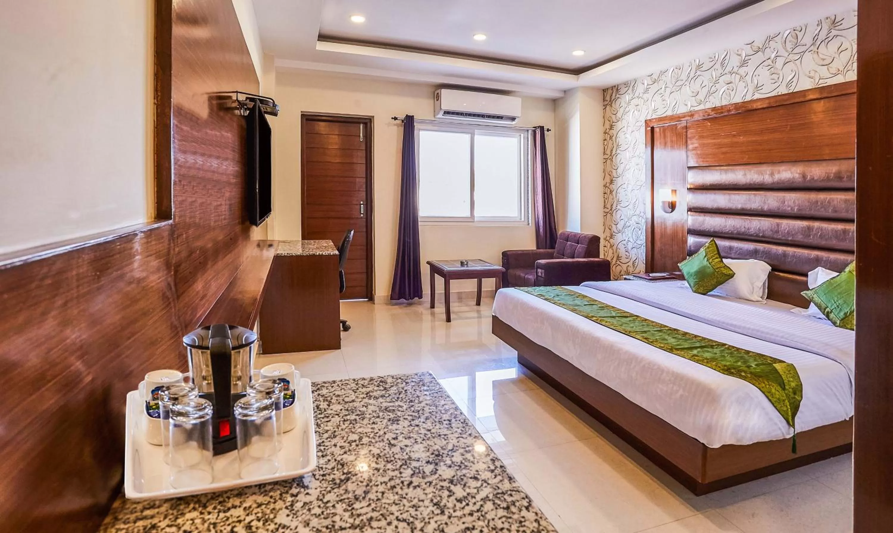 Bedroom, Bed in Treebo Grand Legacy Elite With Roof Top Cafe