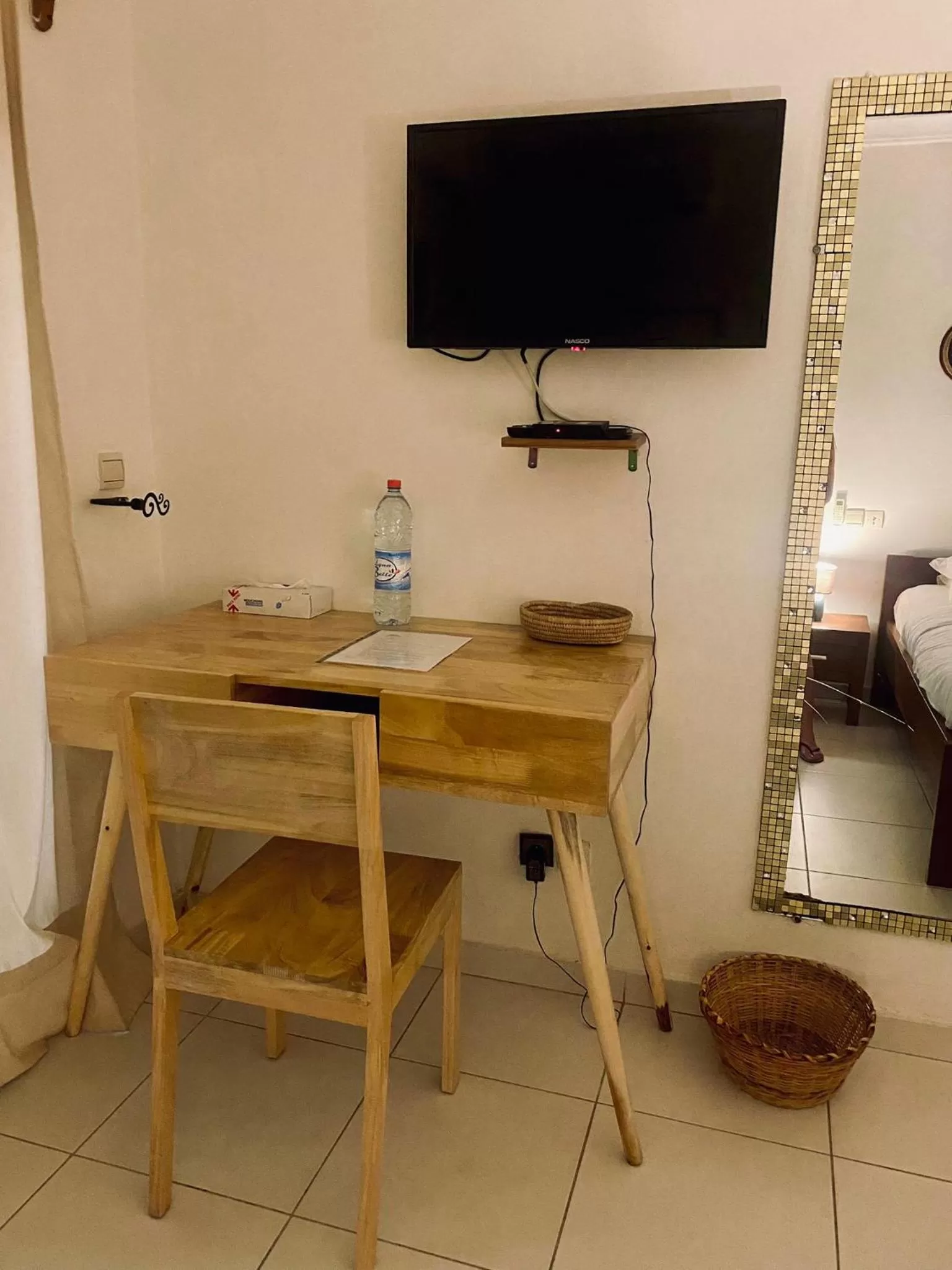 TV/Entertainment Center in L'Oasis Guesthouse