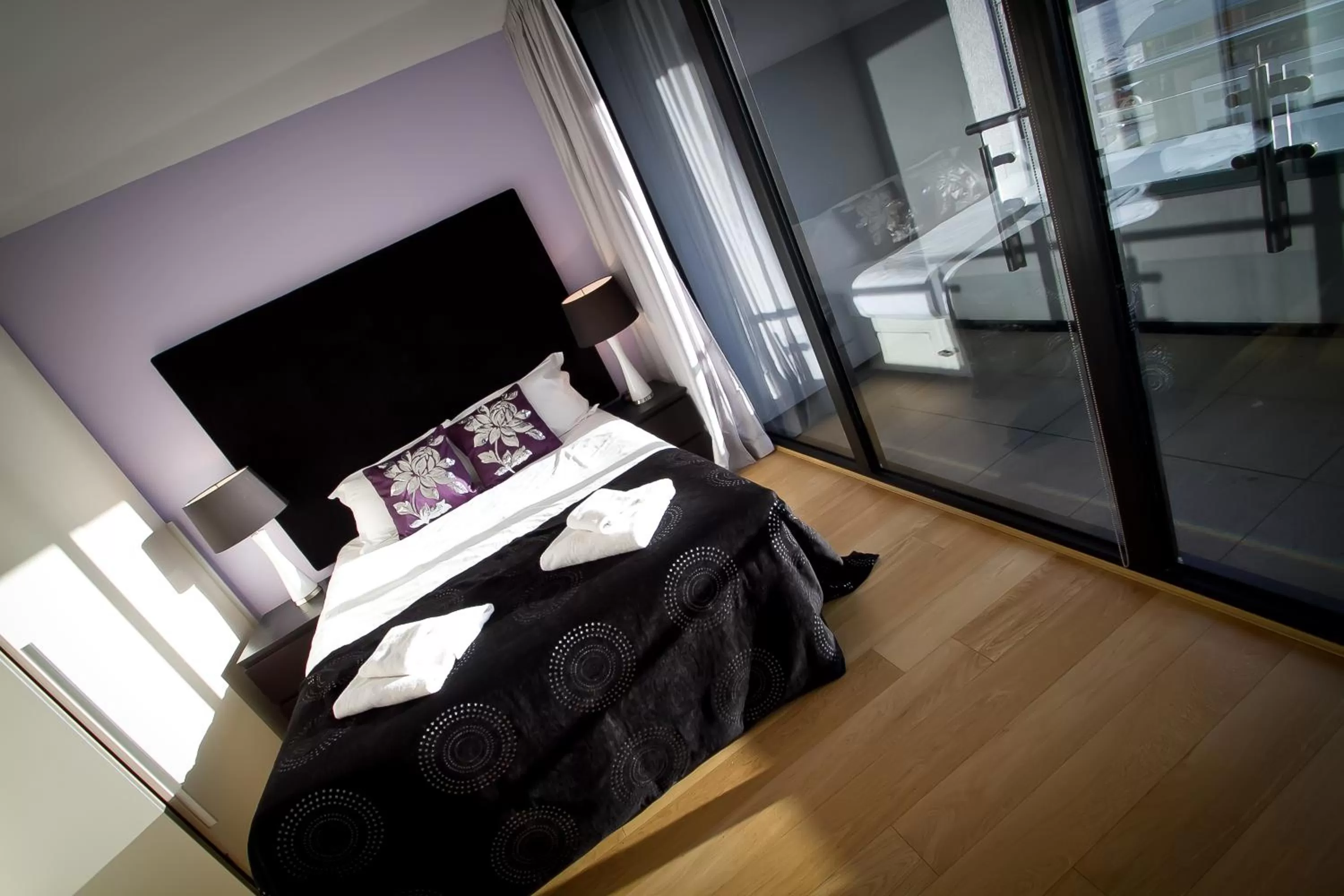 Bed in Merchant Quarters Apartments