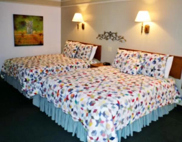 Bed in Covered Wagon Motel Lusk WY