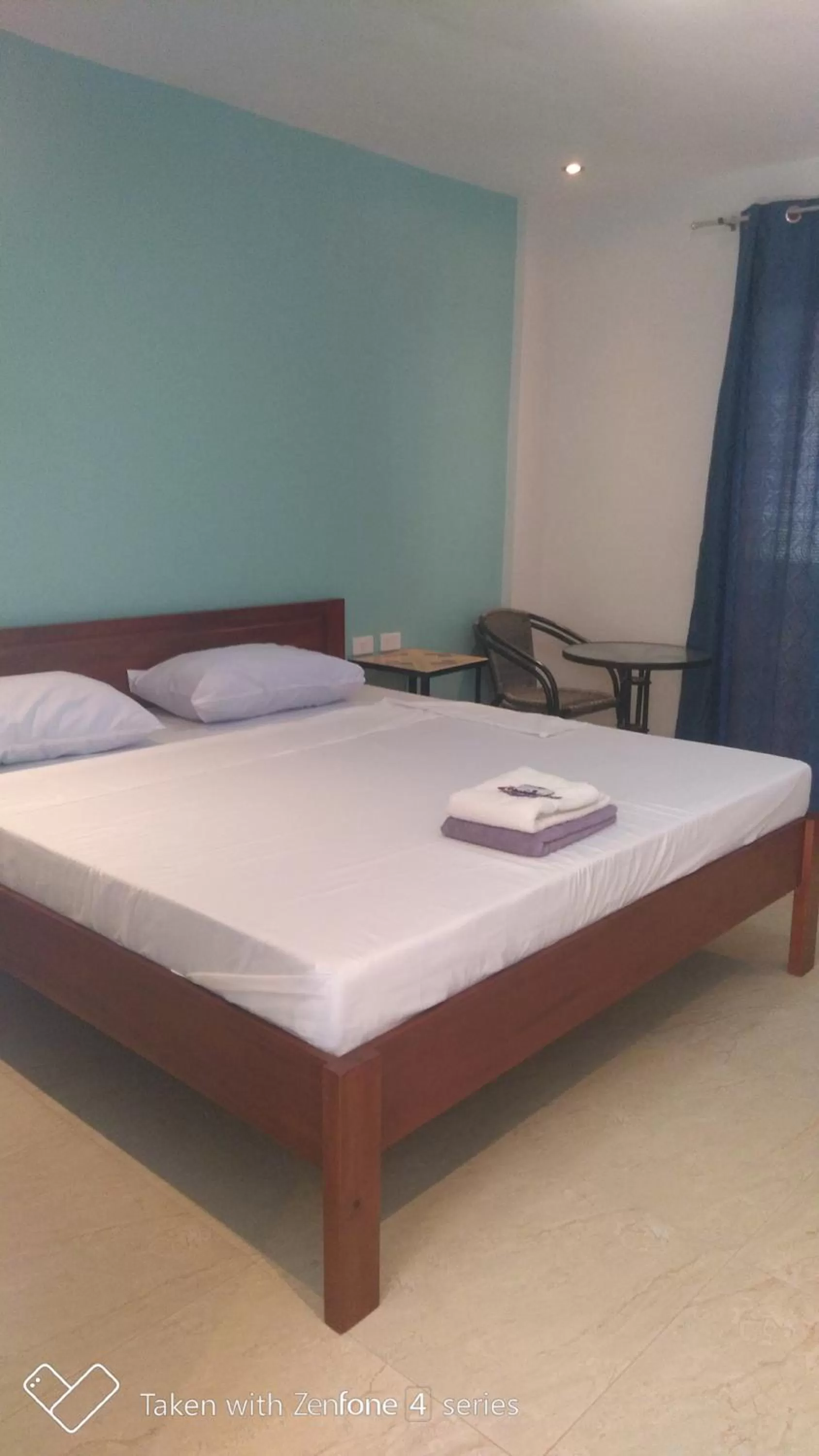 Bed in D & B BLUESTAR BEACH RESORT