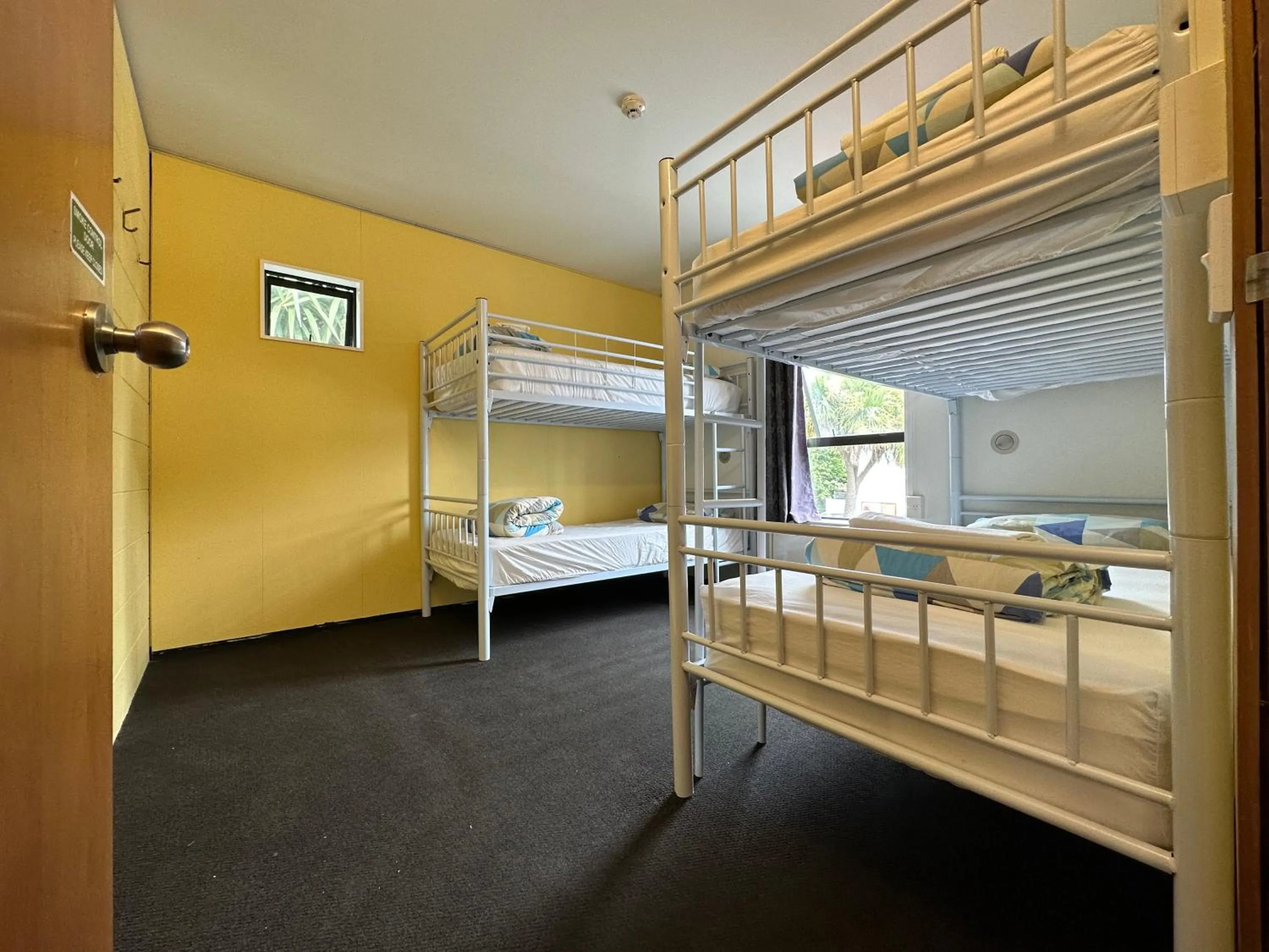 Bed in Around The World Backpackers