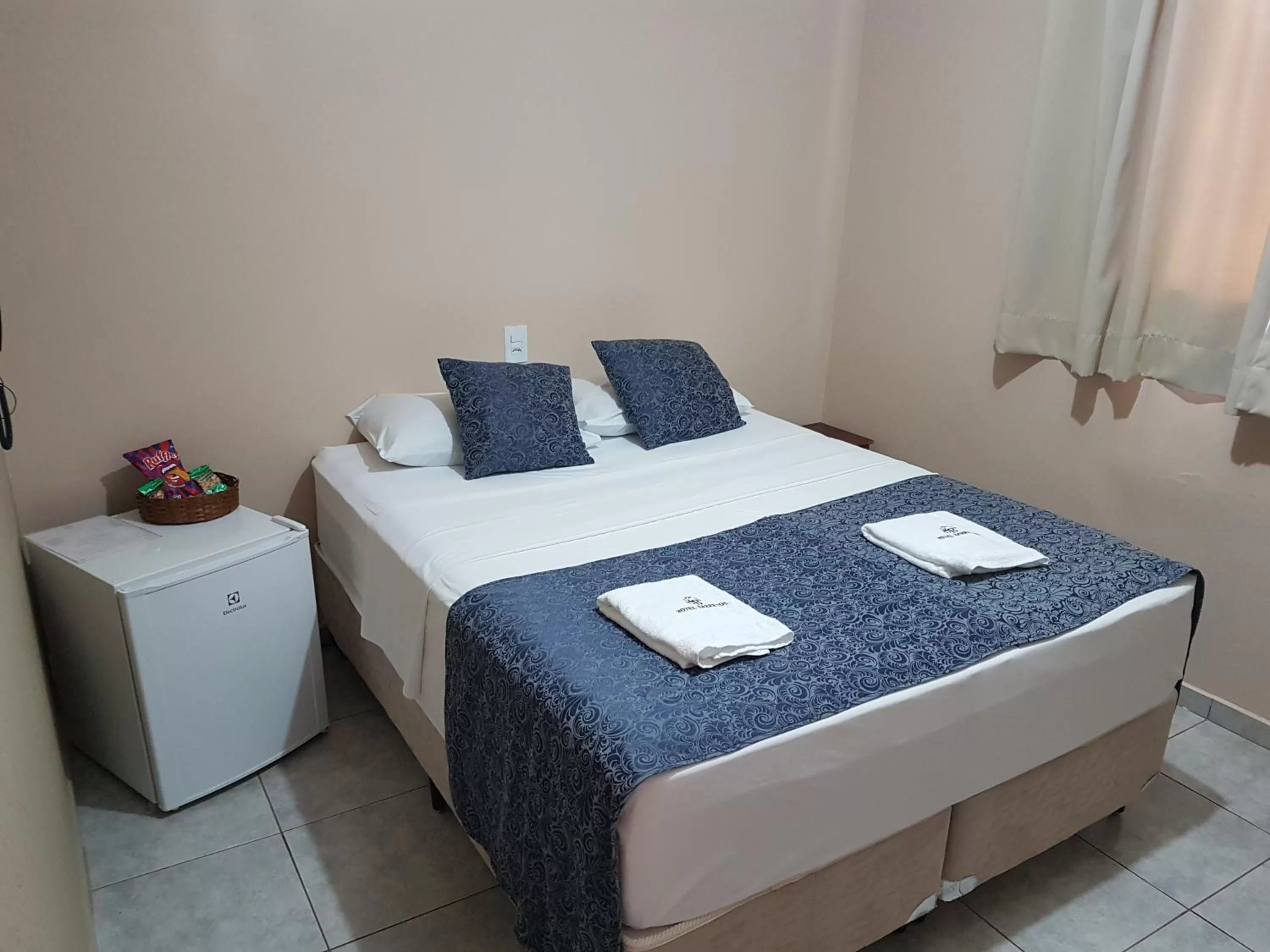 Bed in Hotel Barretos