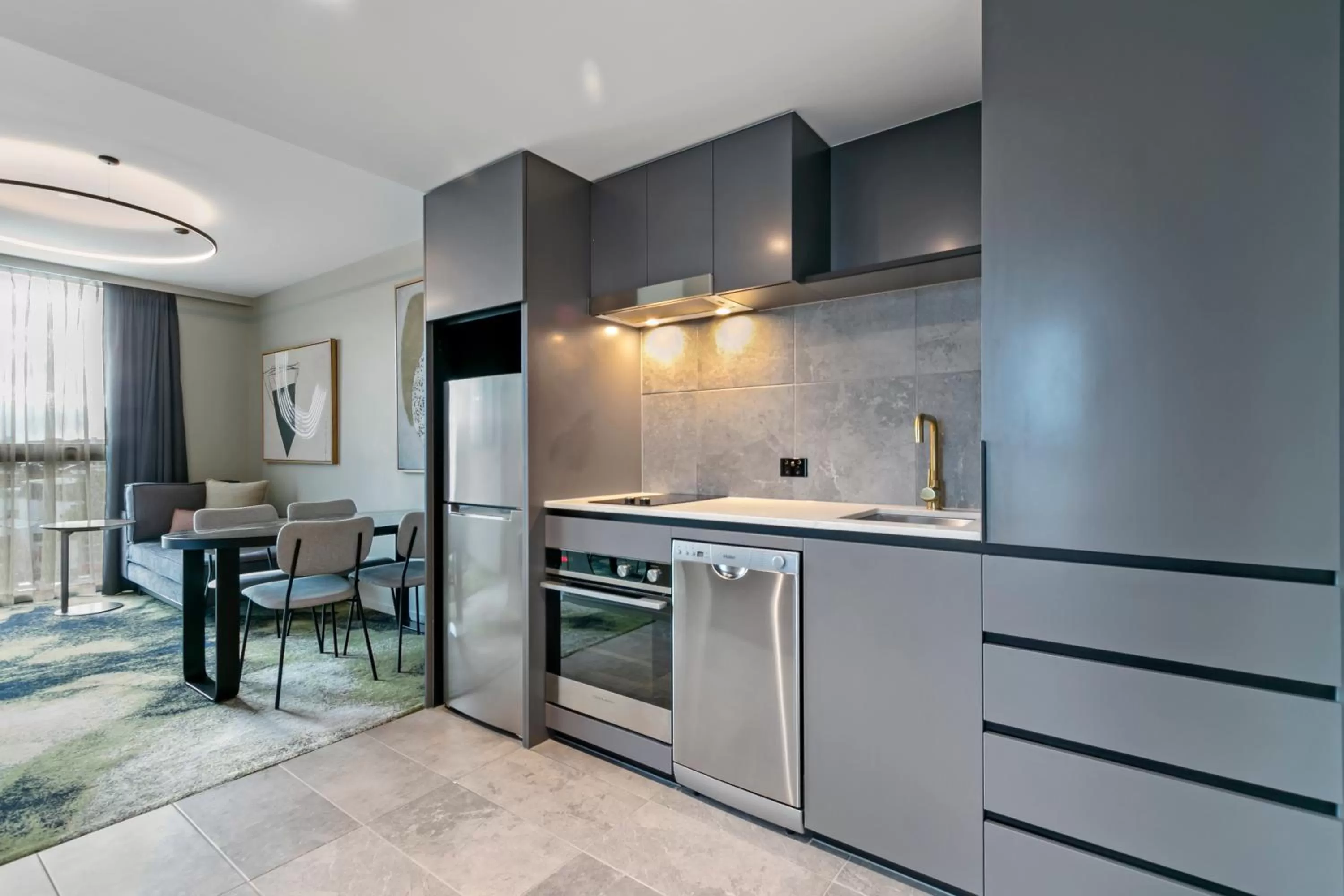 Kitchen or kitchenette in Melbourne City Apartment Hotel