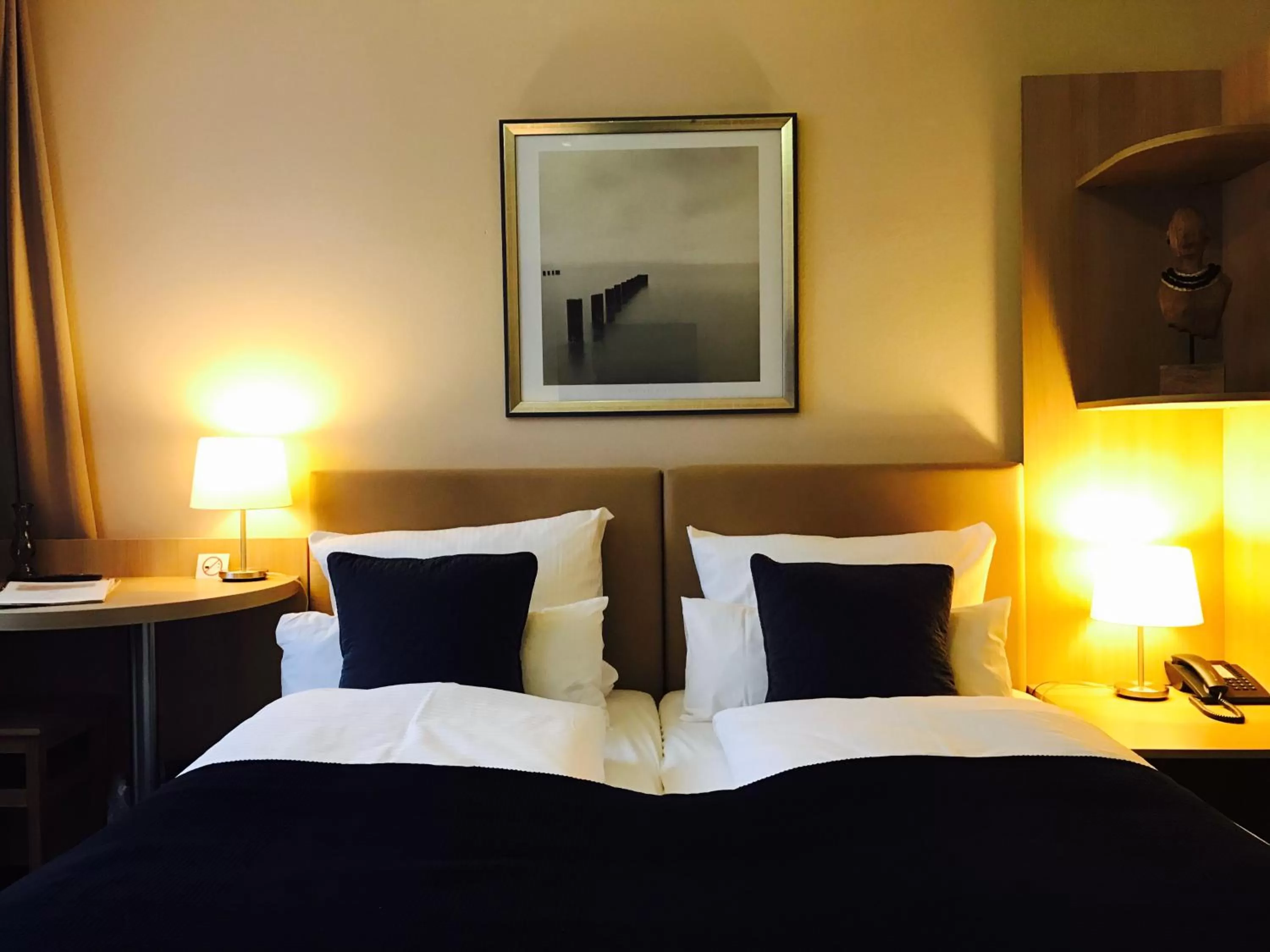 Bed in ONNO Boutique Hotel & Apartments