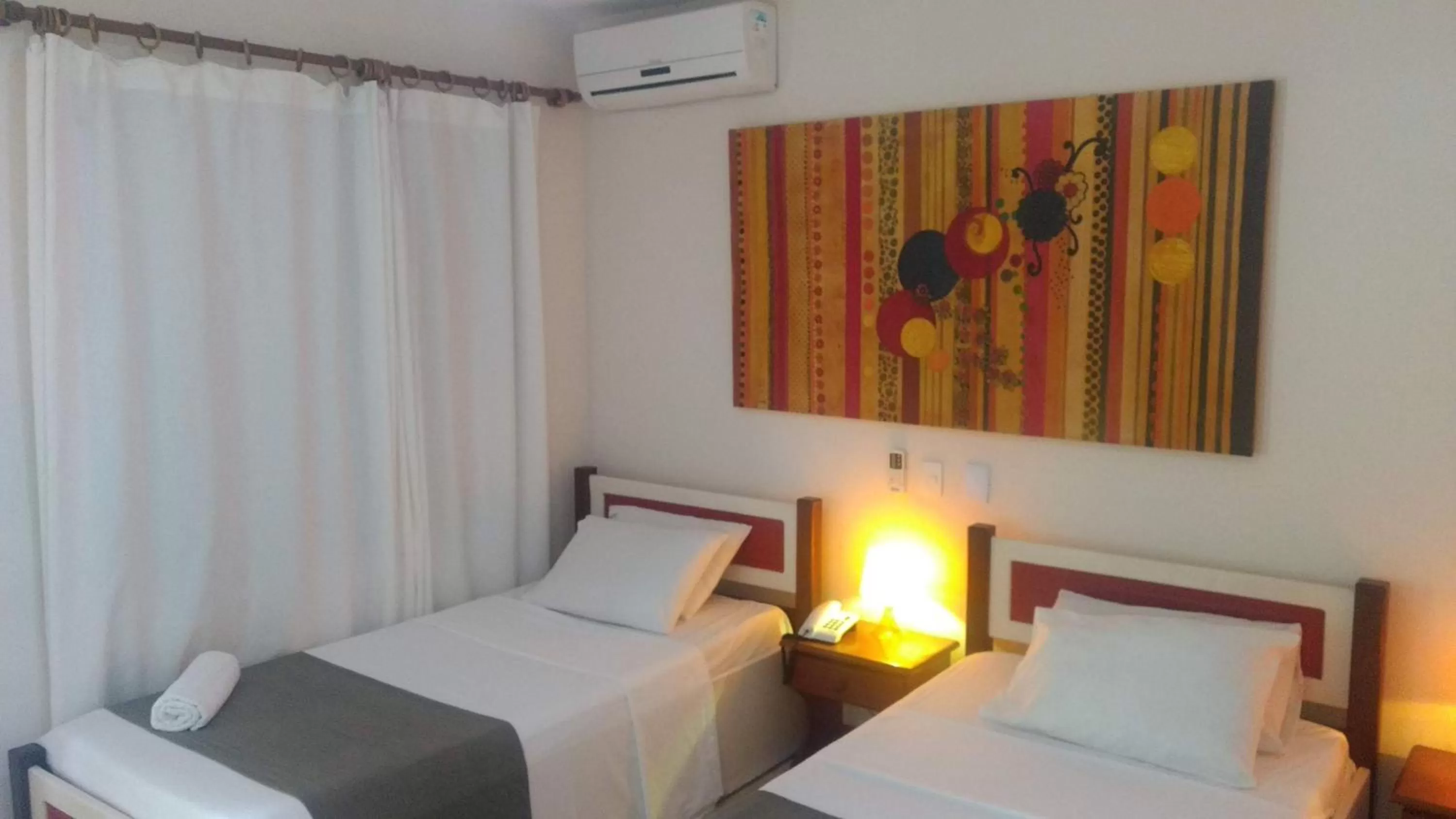 Bed in Hotel Pousada Salvador Paradise