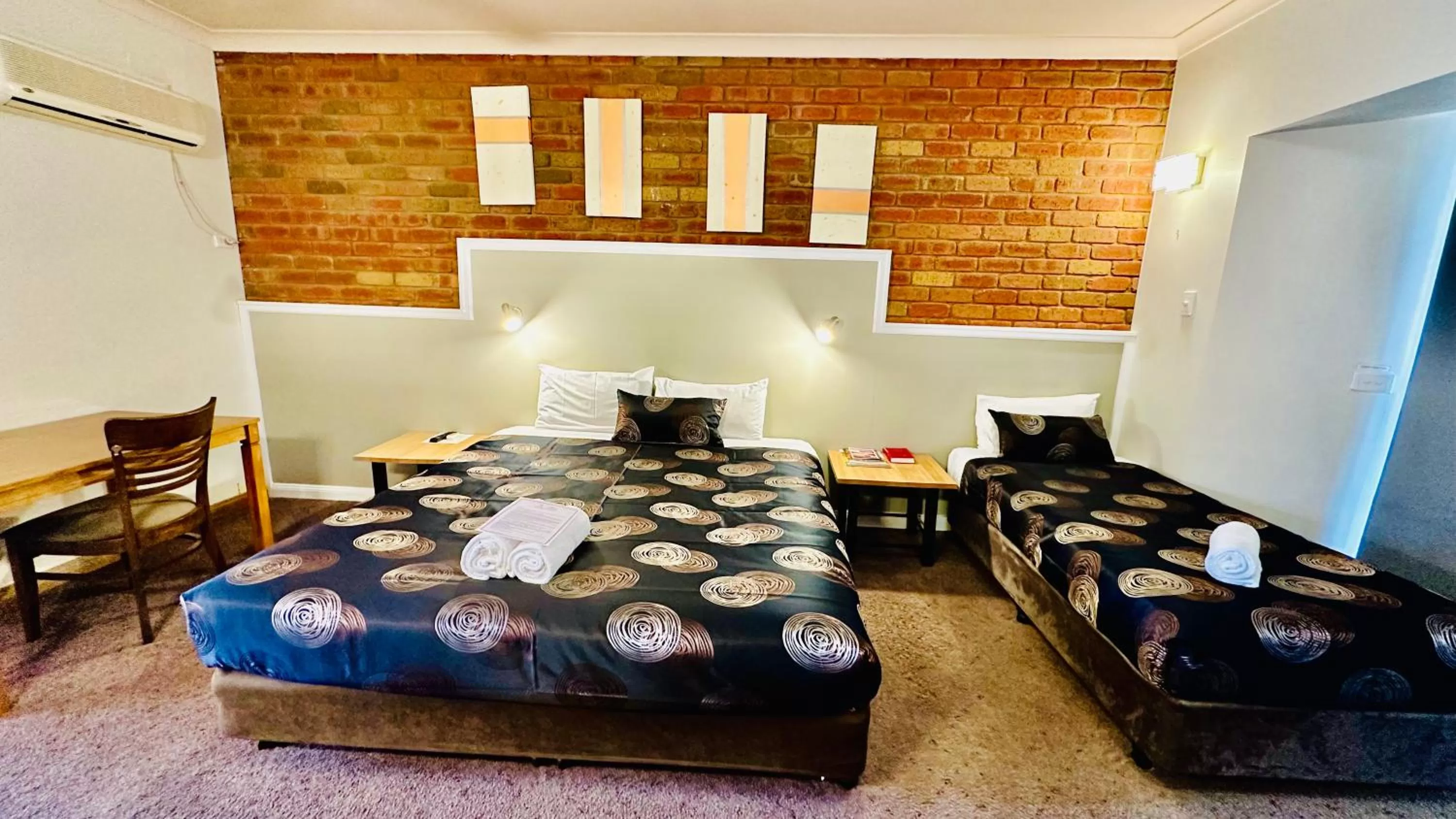 Bed in Early Australian Motor Inn