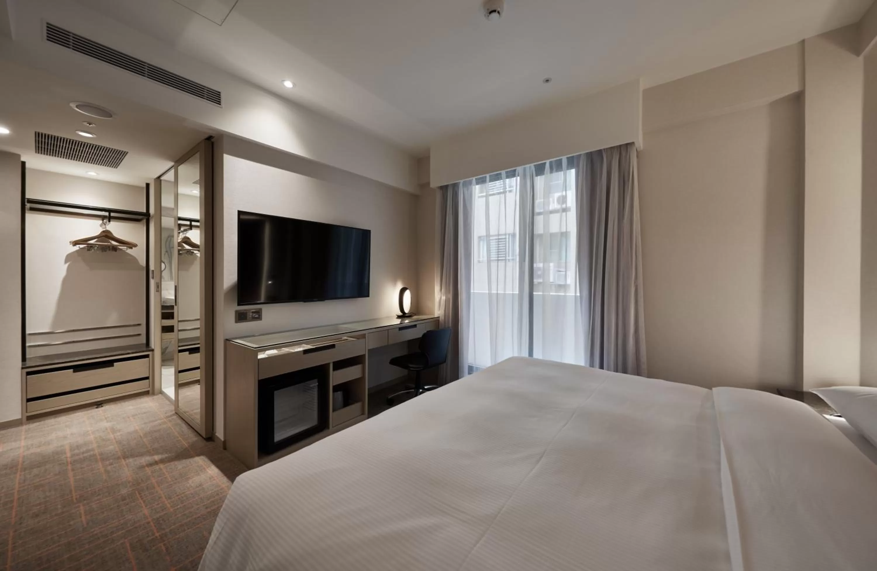 Communal lounge/ TV room, Bed in K Hotels Taipei Linsen