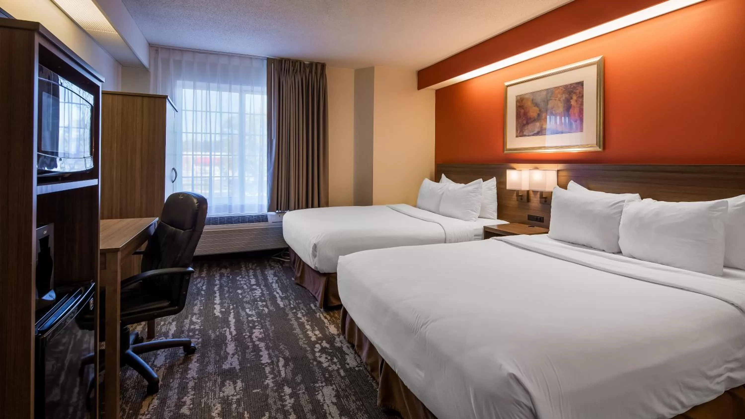 Photo of the whole room, Bed in Charlevoix Inn & Suites SureStay Collection by Best Western