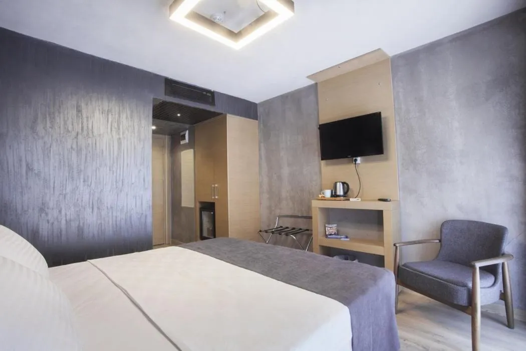 Bed in Red Stone Hotel