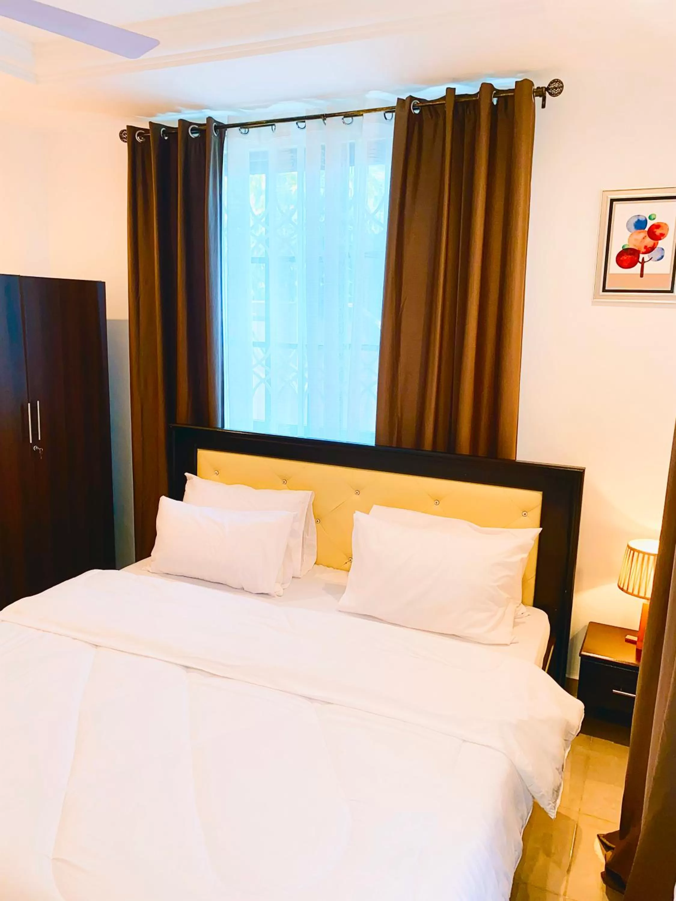 Bed in AIDEN HOMES AND APARTMENTS