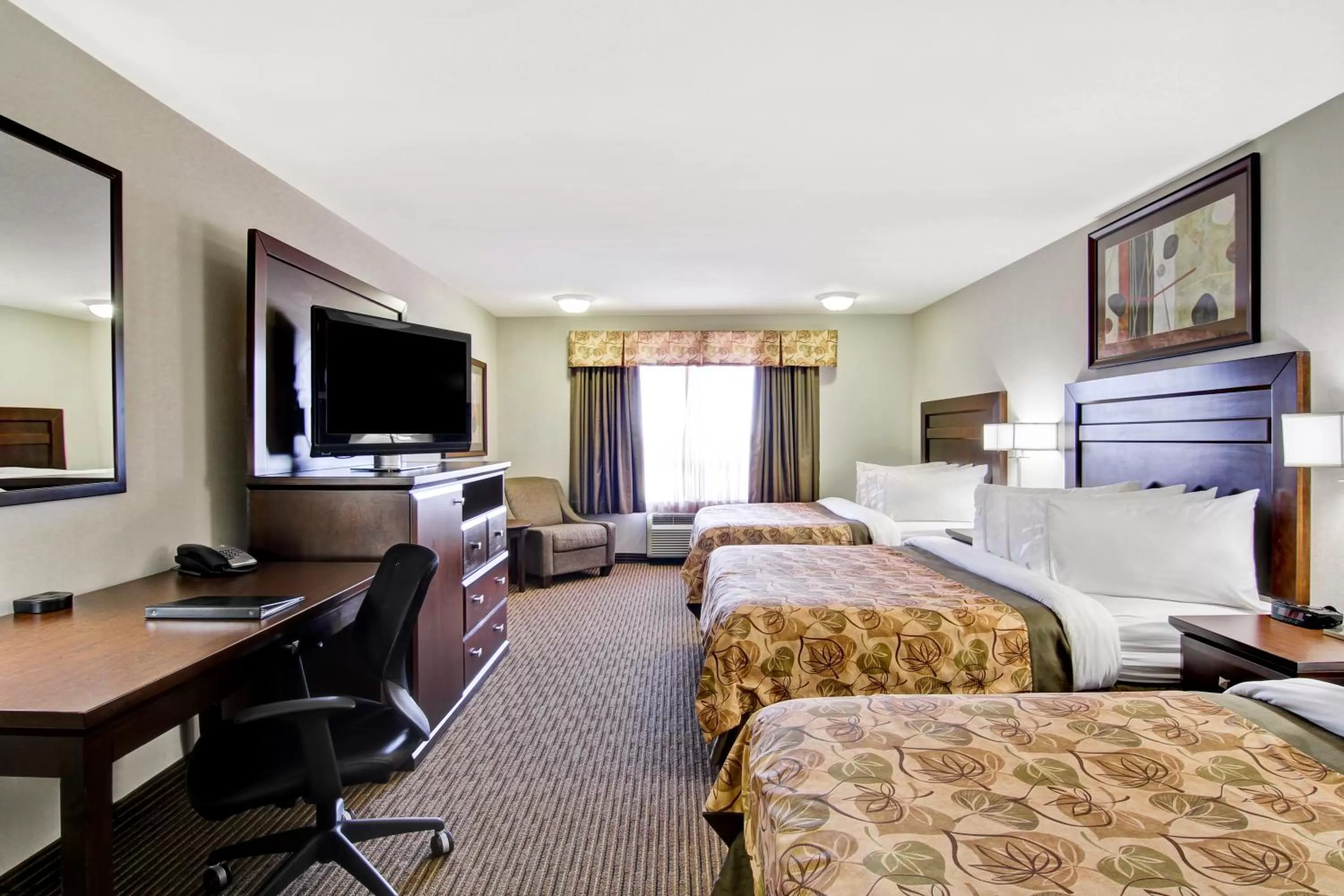 Standard Queen Room with Three Queen Beds in Canalta Hotel Weyburn