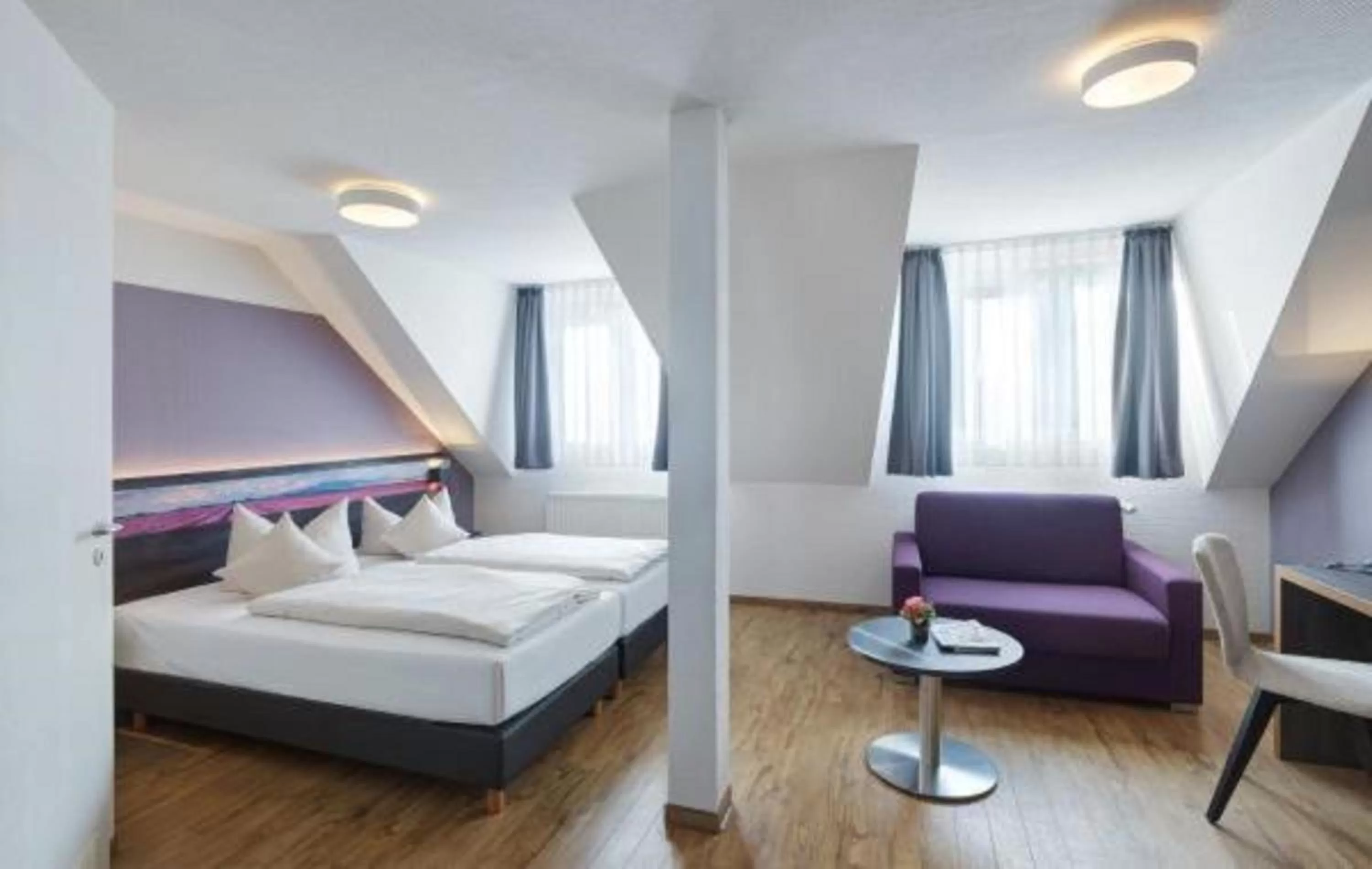 Photo of the whole room, Bed in Art Hotel Aachen