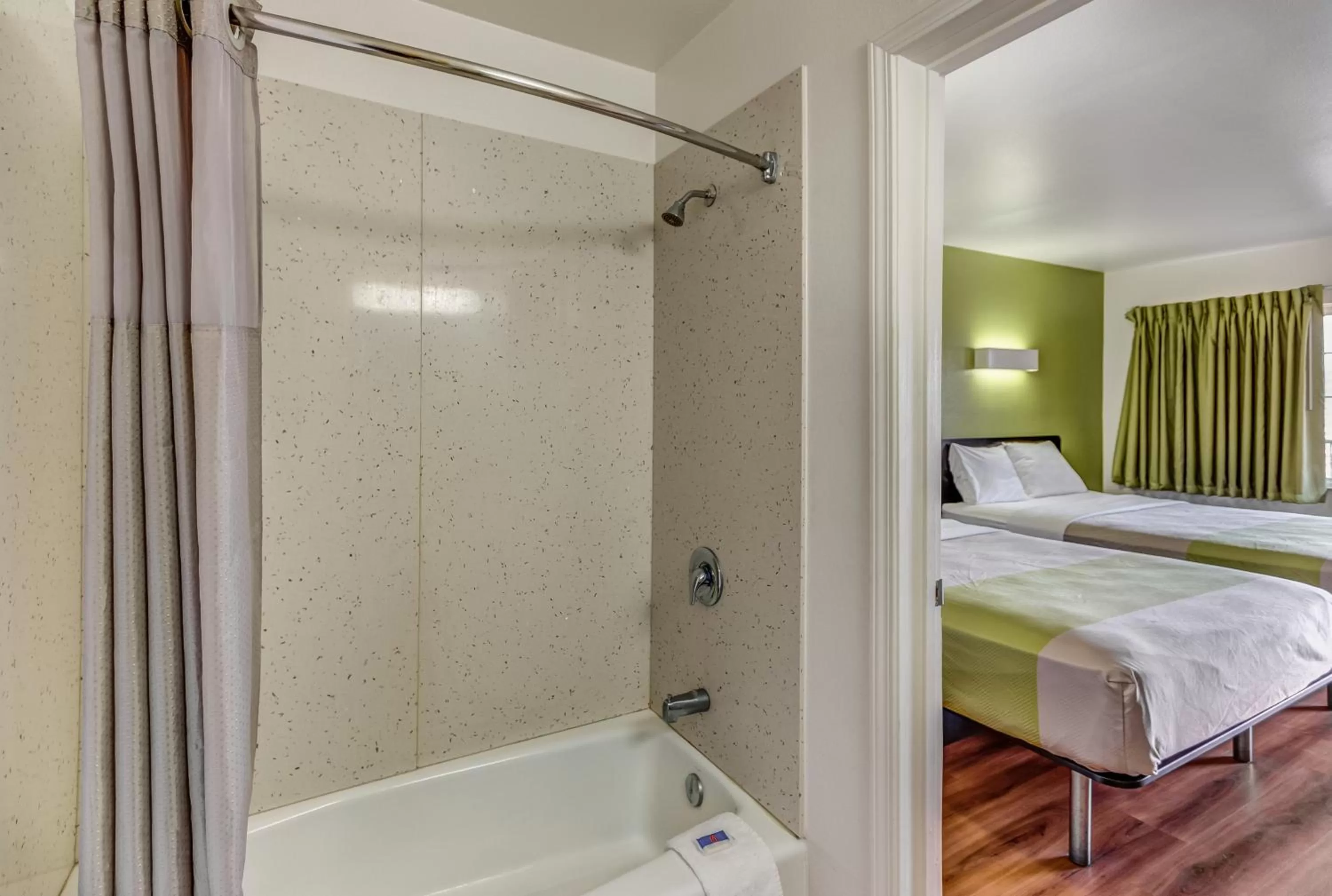 Bathroom, Bed in Motel 6-Visalia, CA