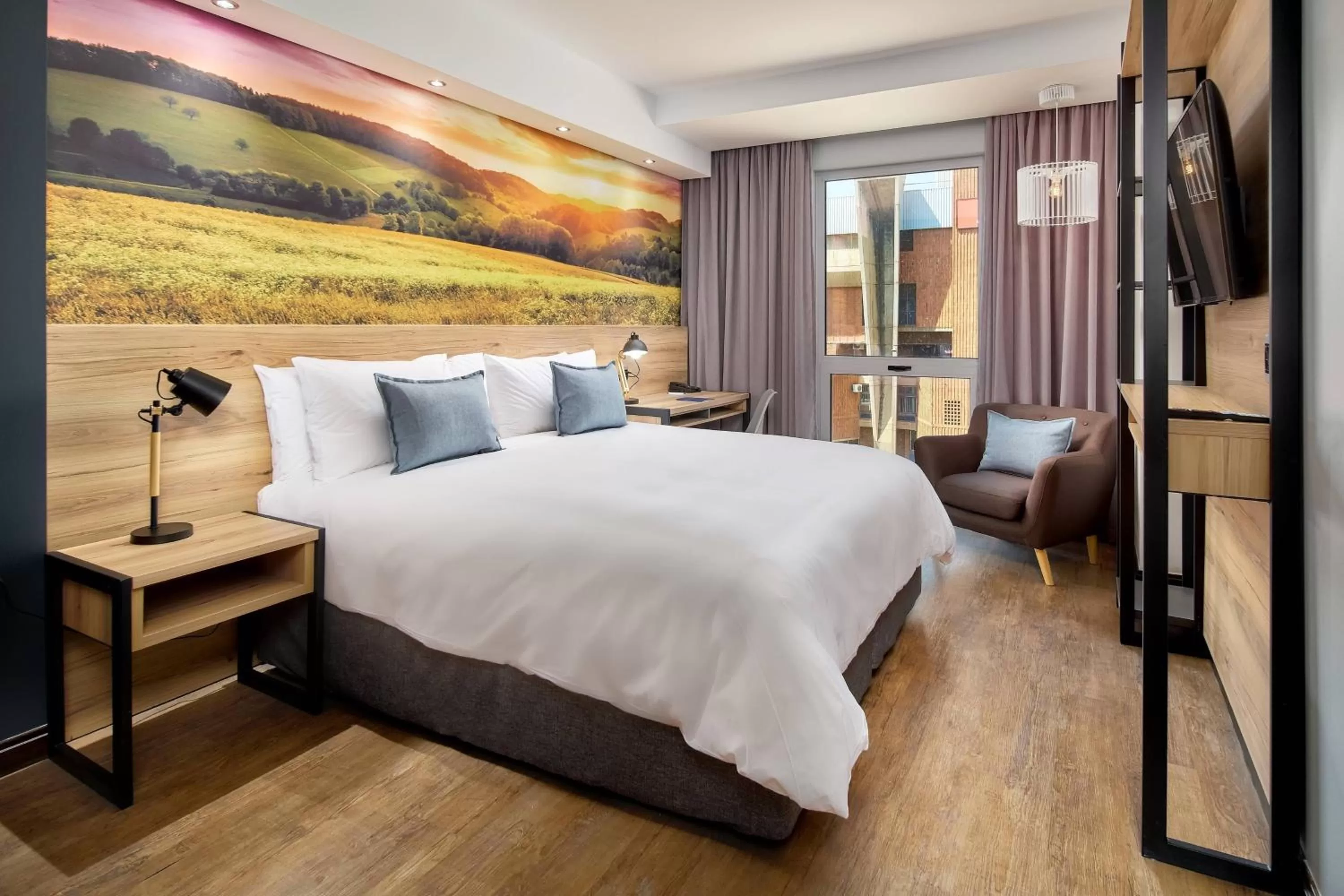 Photo of the whole room, Bed in Protea Hotel by Marriott Pretoria Loftus Park