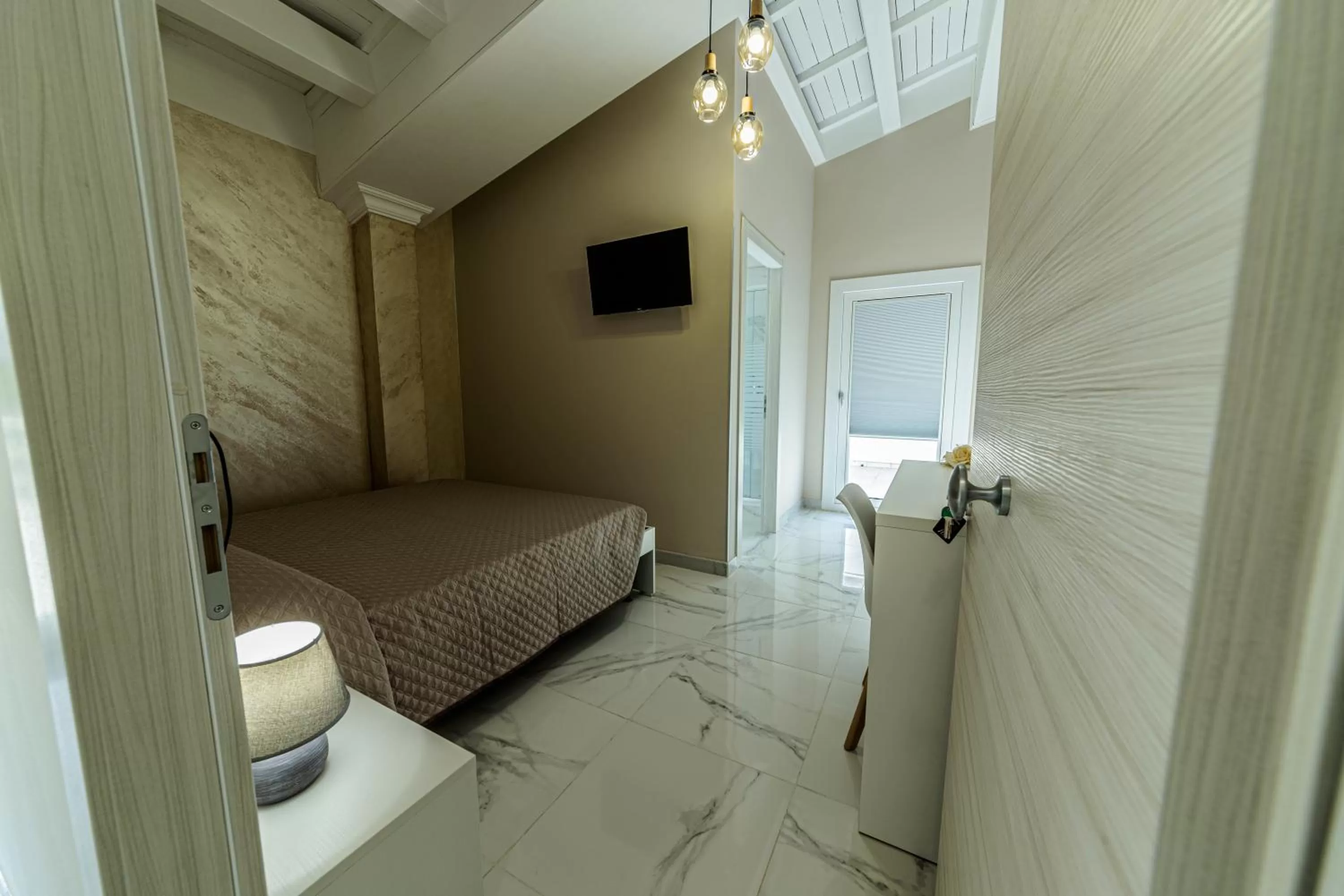 Photo of the whole room, Bed in Corleone GUESTHOUSE