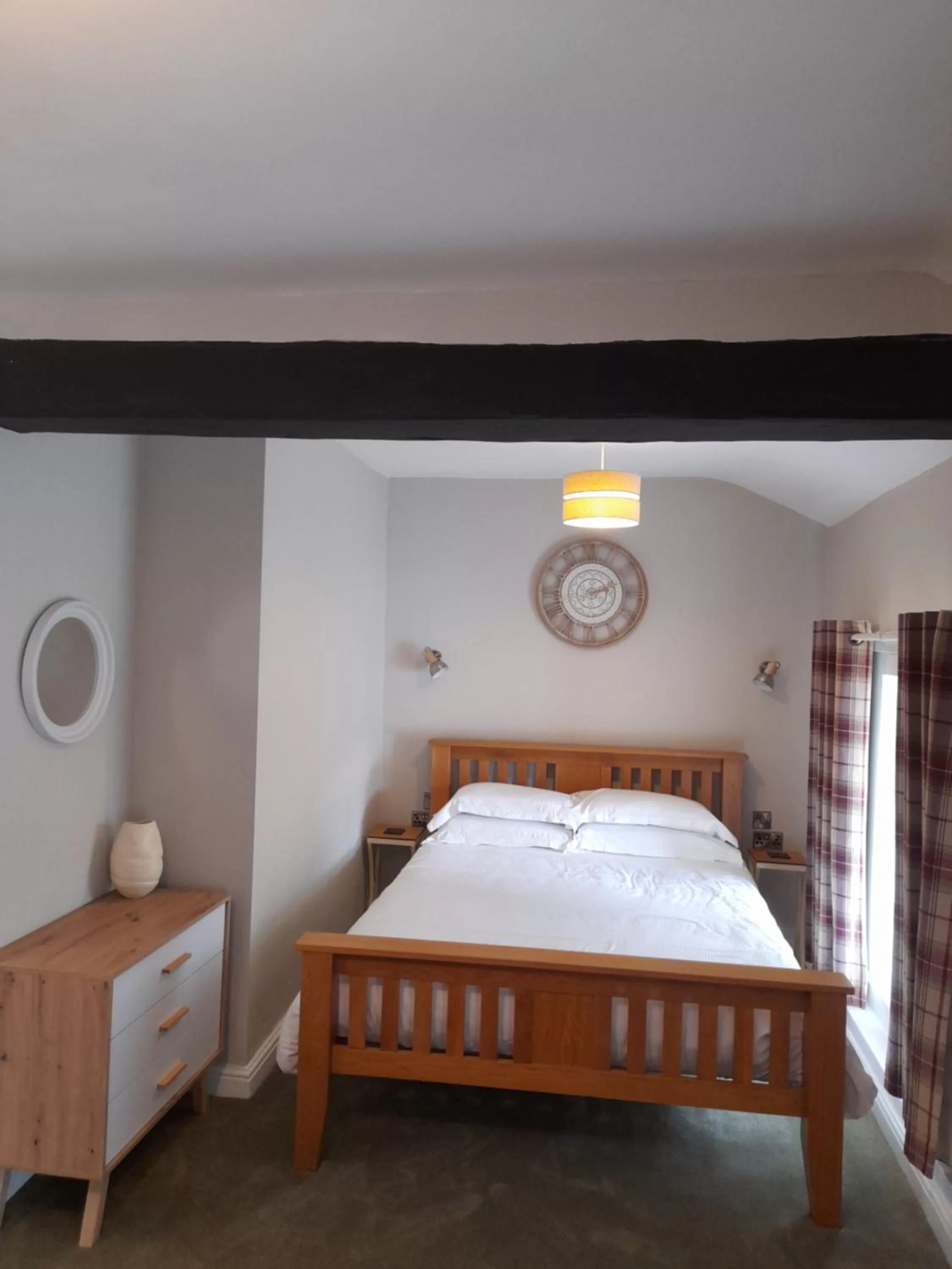 Bed in The Raven Inn