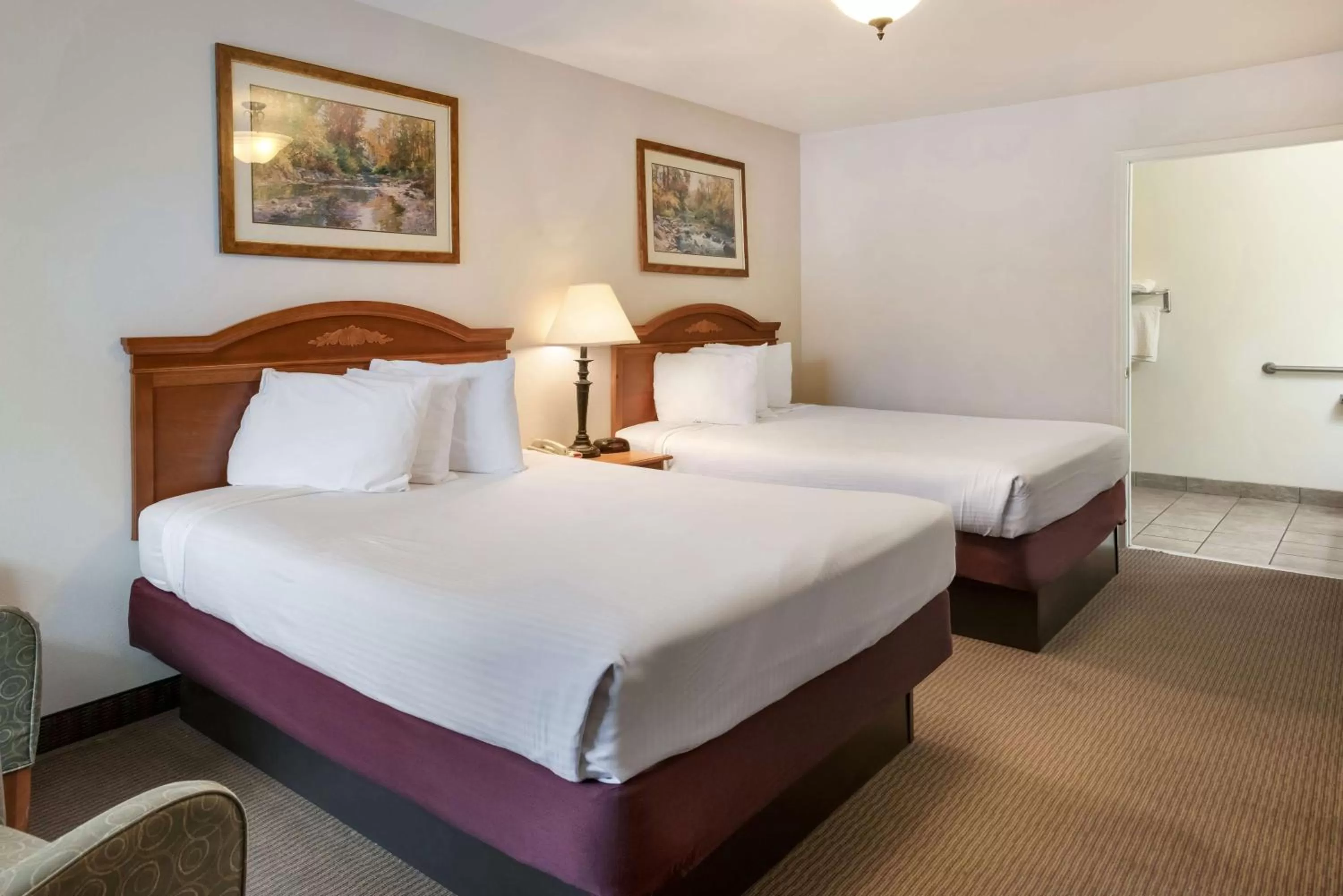 Queen Room with Two Queen Beds - Hearing Accessible in SureStay Hotel by Best Western Leesville