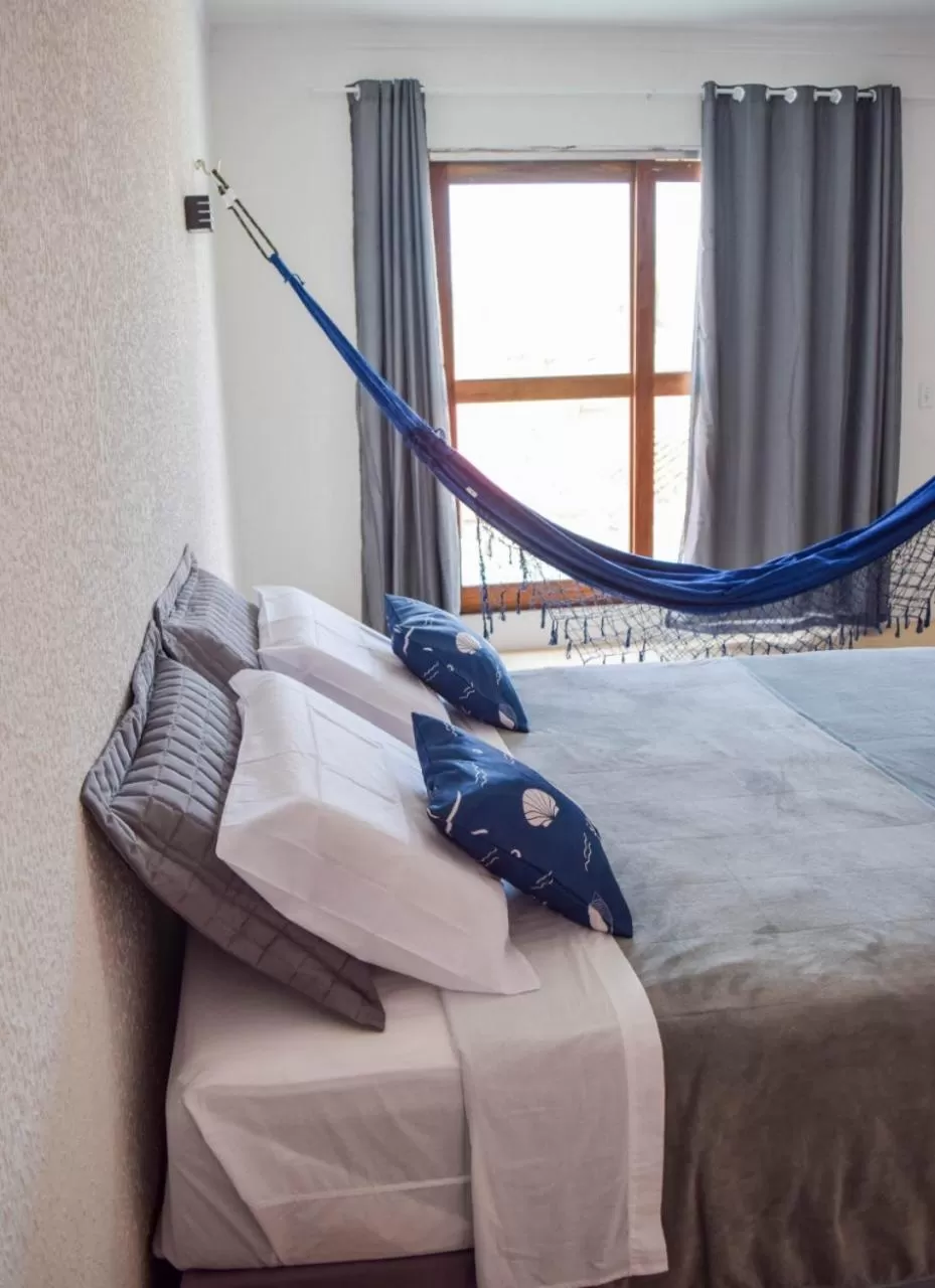 Bed in Pousada Village Sonhos Camocim