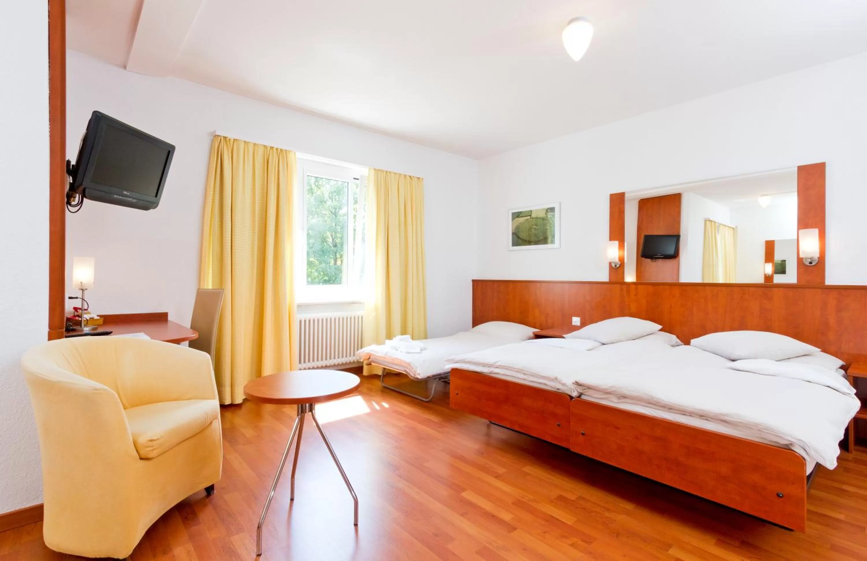 Photo of the whole room, Bed in Sorell Hotel Sonnental Dübendorf