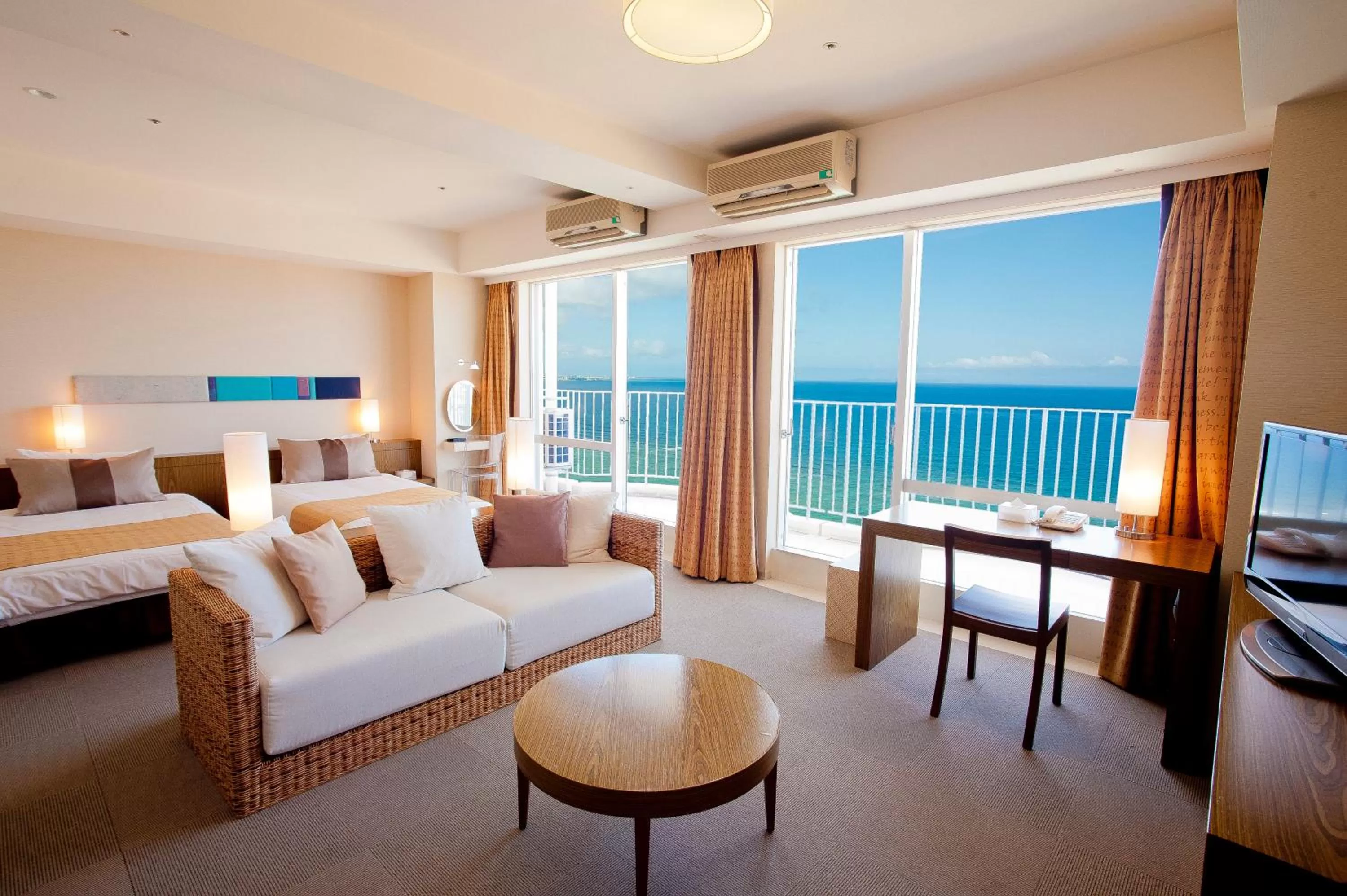 Photo of the whole room, Bed in The Beach Tower Okinawa