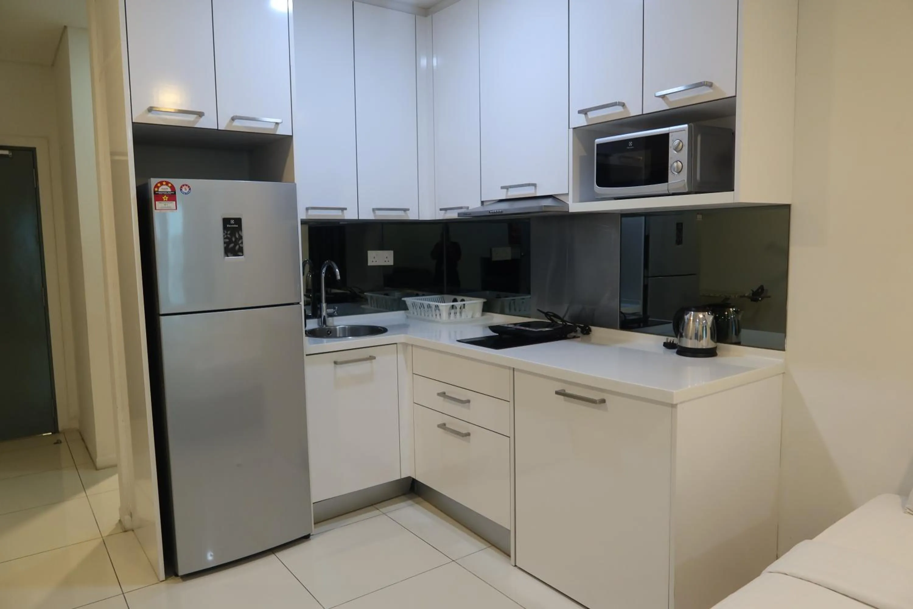 Kitchen or kitchenette in Summer Suites Residences by Subhome