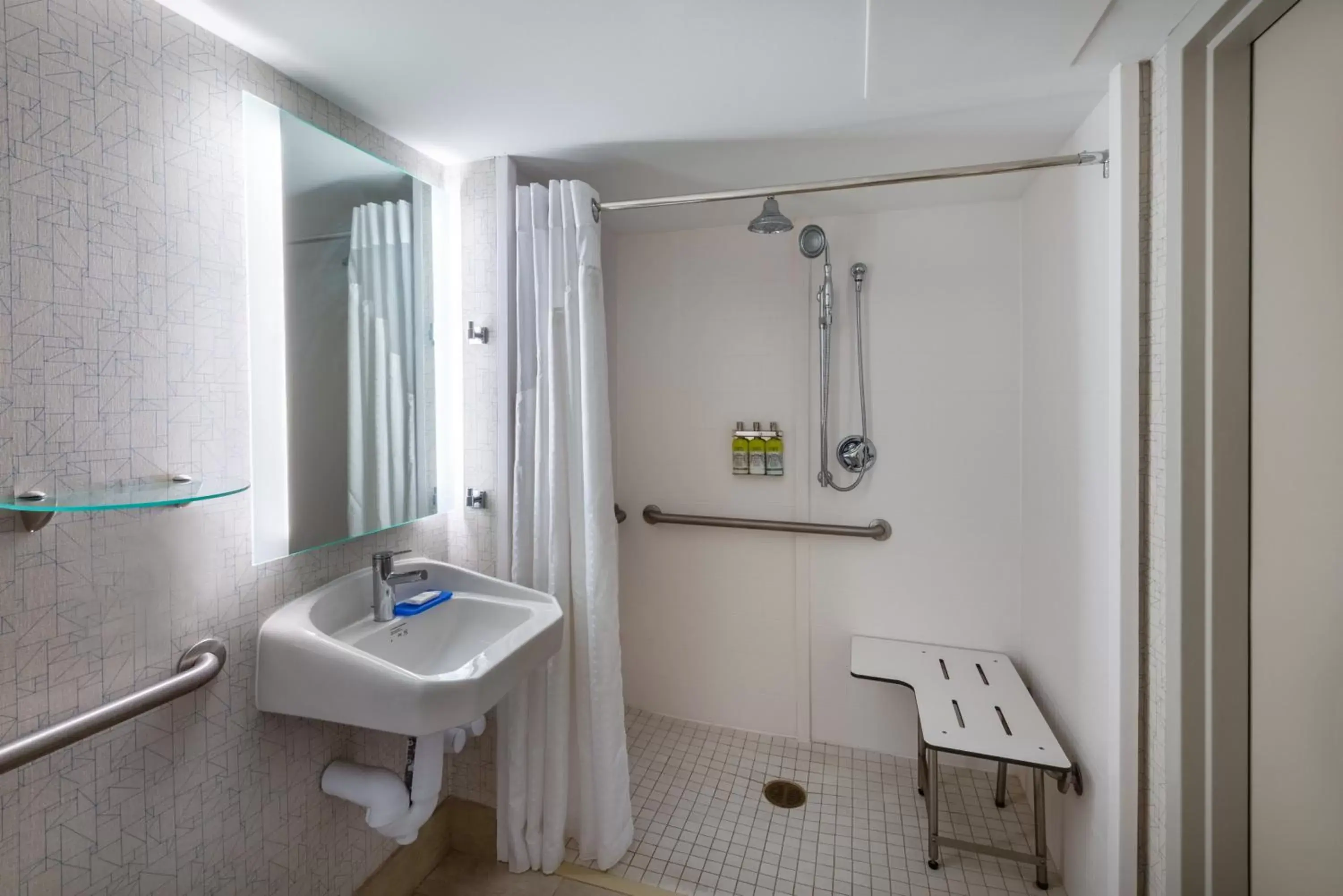 Standard King Room with Roll-in Shower - Mobility Accessible in Holiday Inn Express State College at Williamsburg Square by IHG Standard King Room with Roll-in Shower - Mobility Accessible in Holiday Inn Express State College at Williamsburg Square by IHG