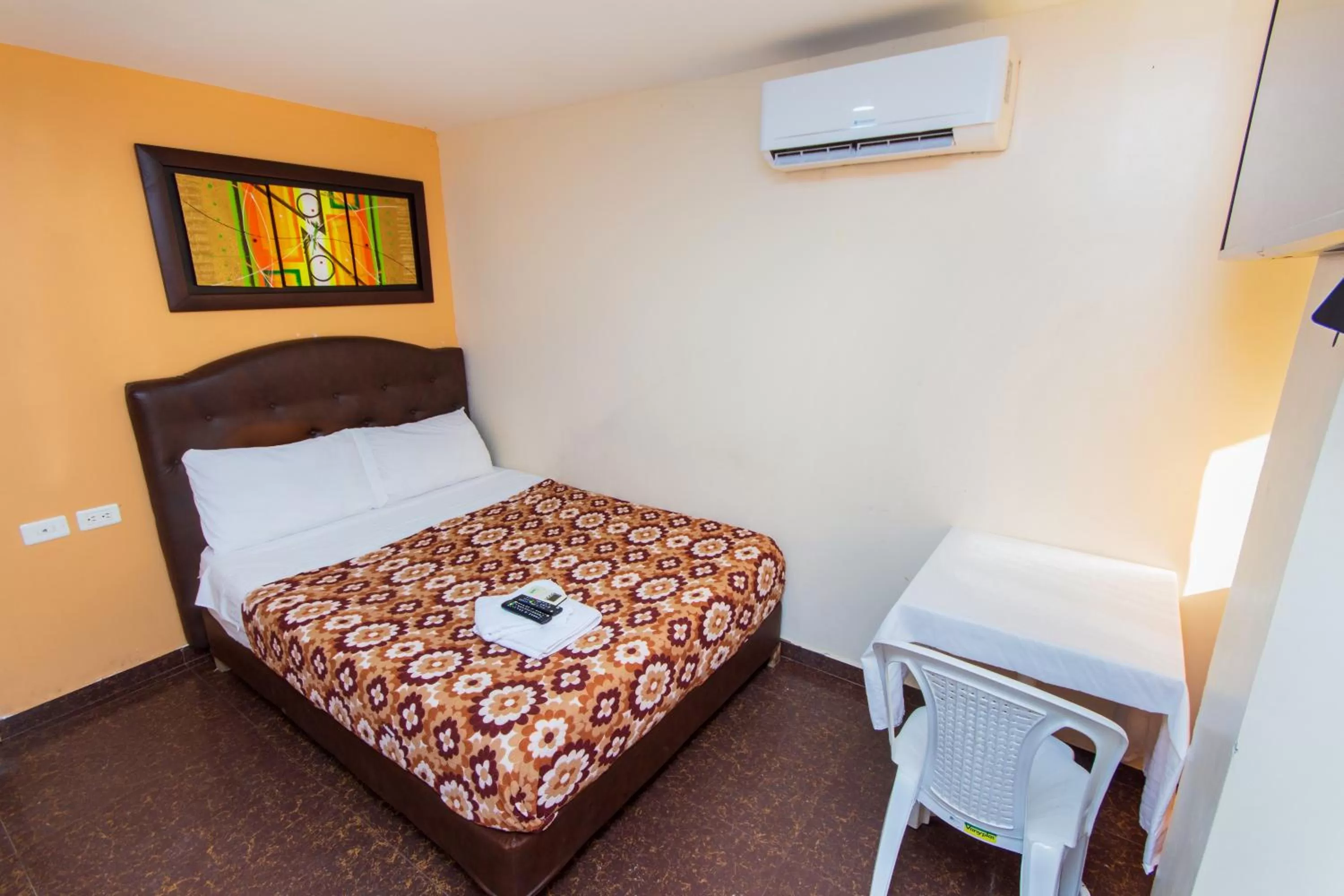 Bed in Hotel Boquilla Suites By GEH Suites