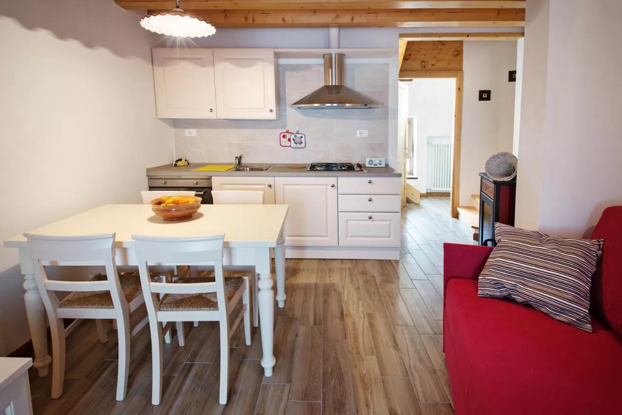 Dining area, Kitchen/Kitchenette in Albergo Diffuso Tolmezzo