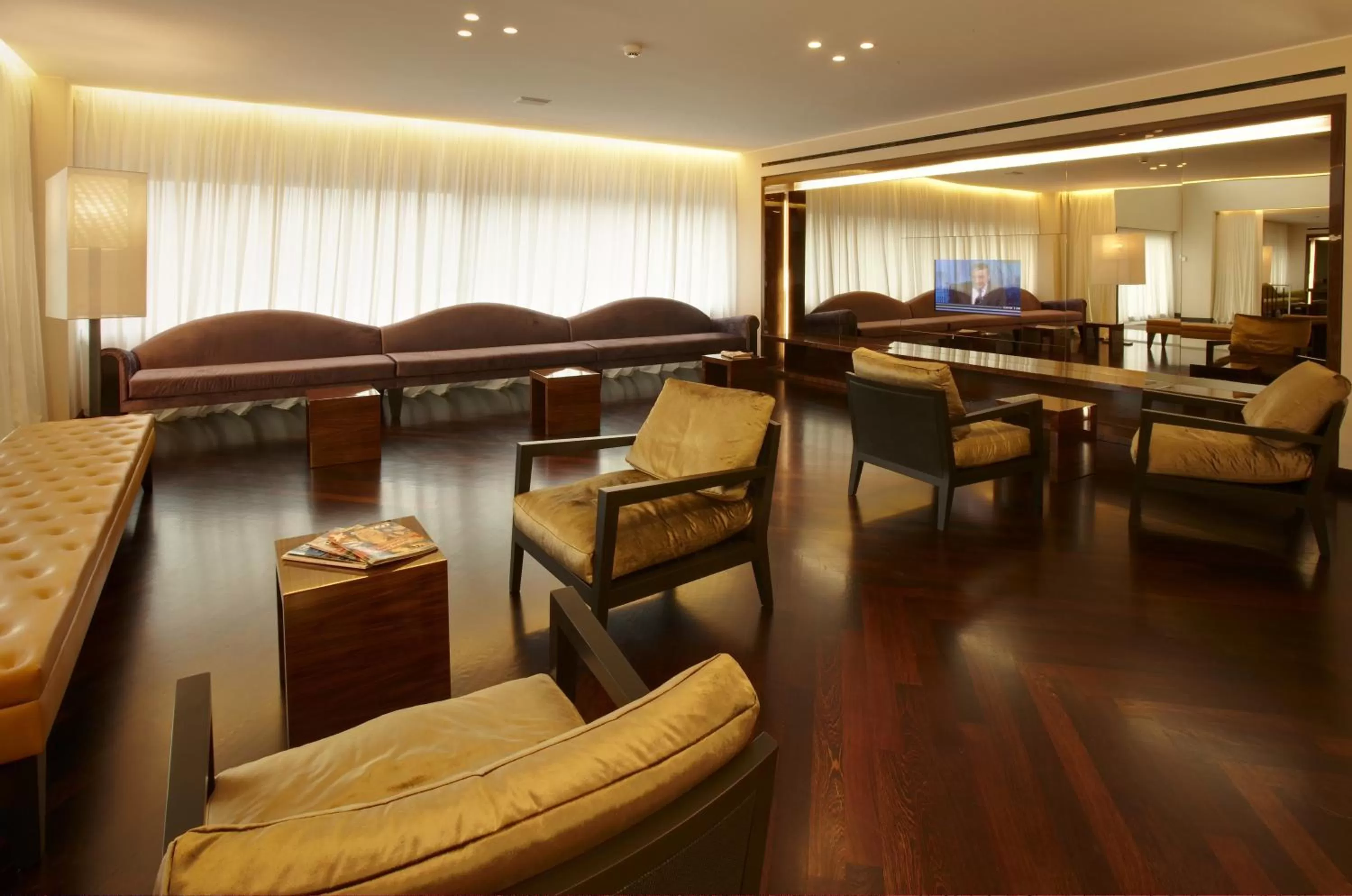 Communal lounge/ TV room in Devero Hotel & Spa, BW Signature Collection