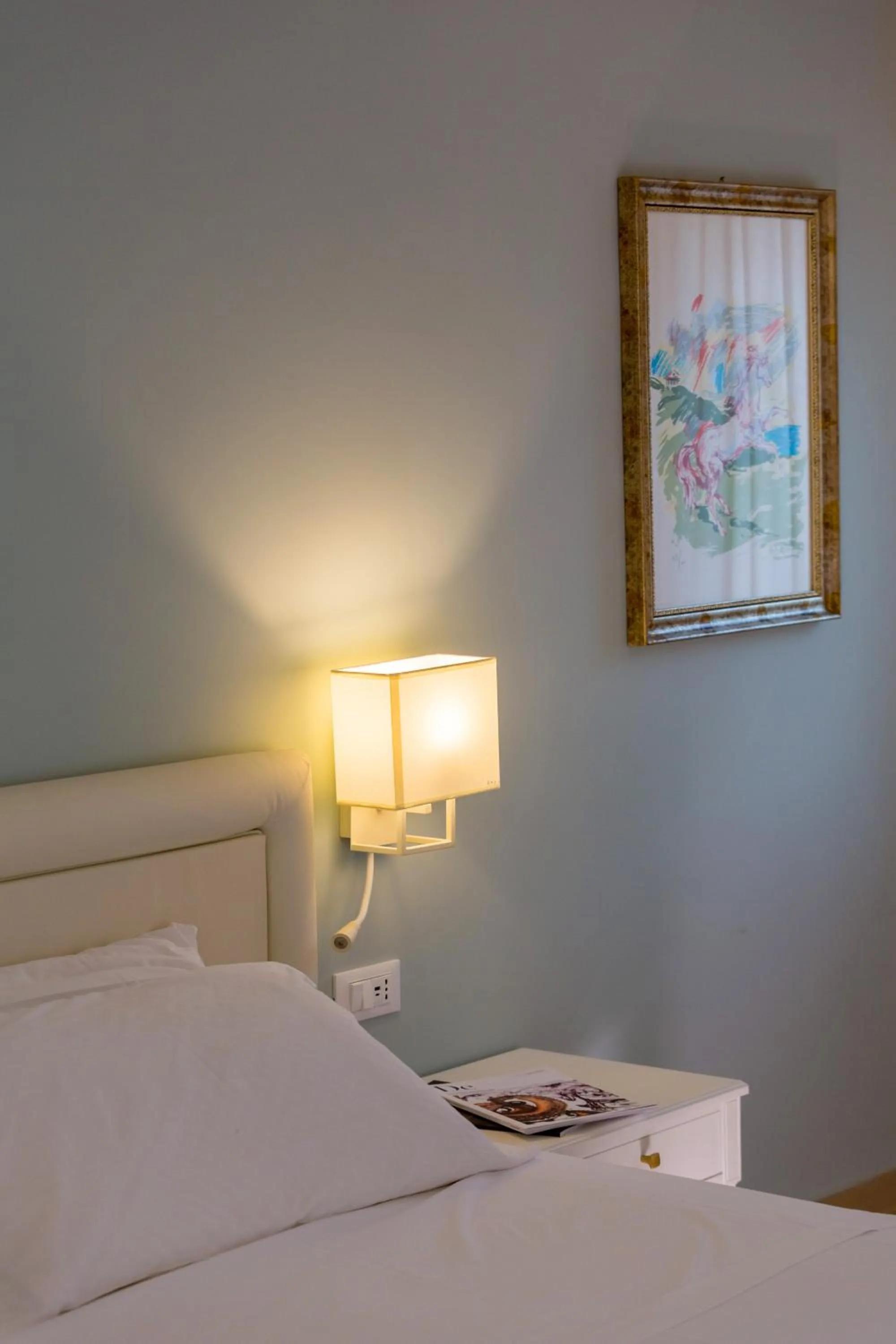 Bed in Hellenia Yachting Hotel & SPA