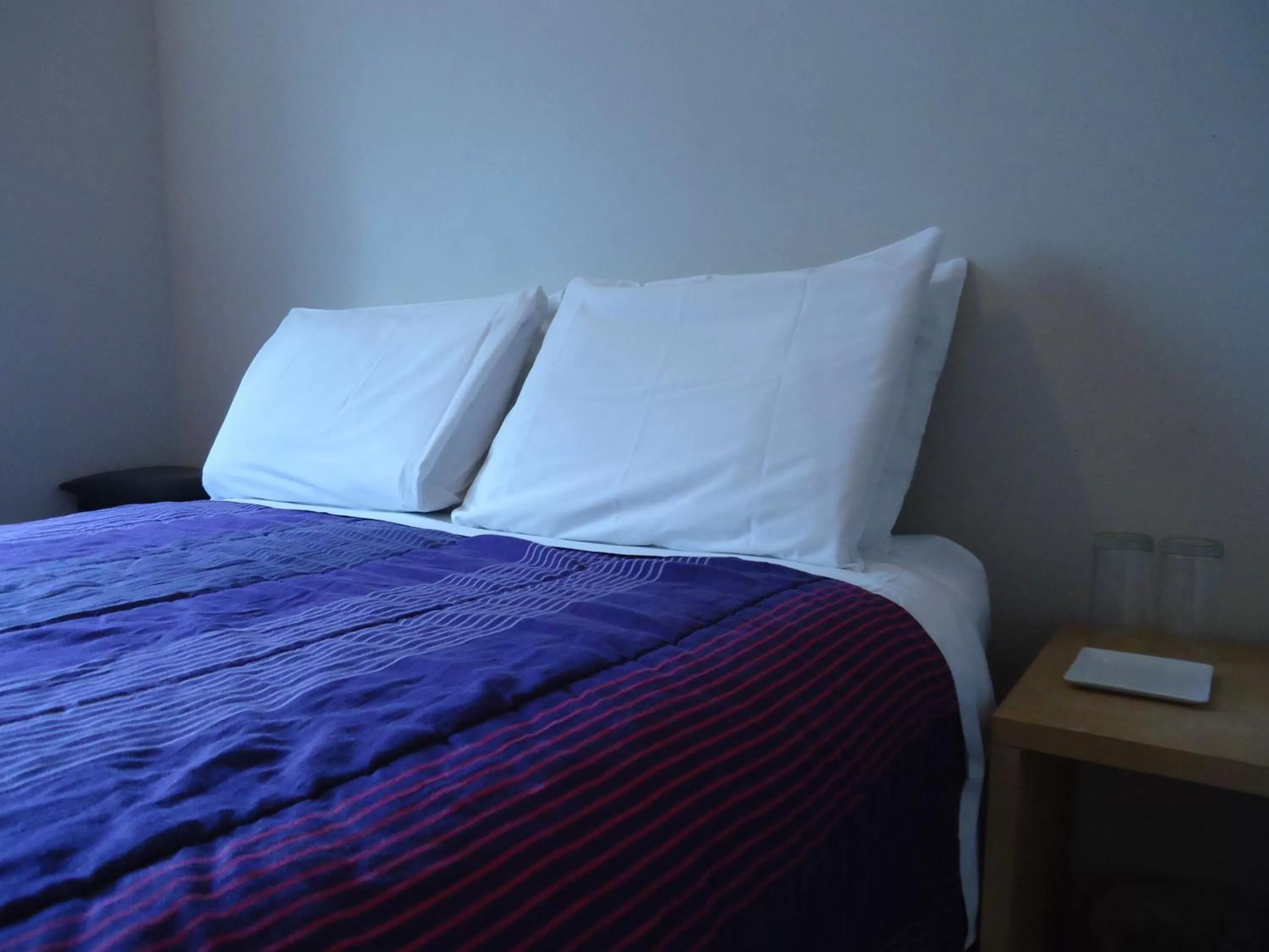 Bed in The Rex Hotel Jazz & Blues Bar