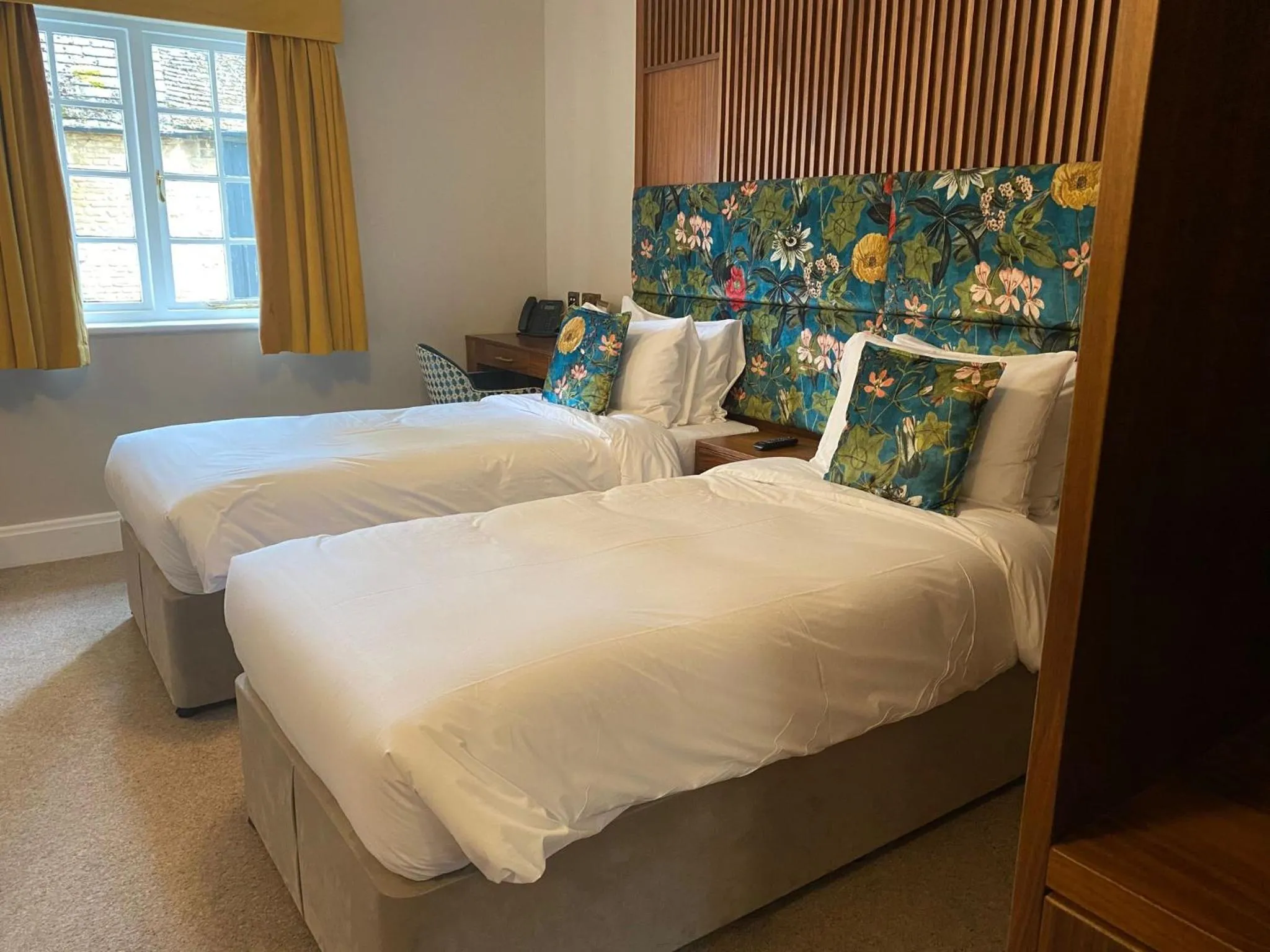 Bed in The Haycock Manor Hotel