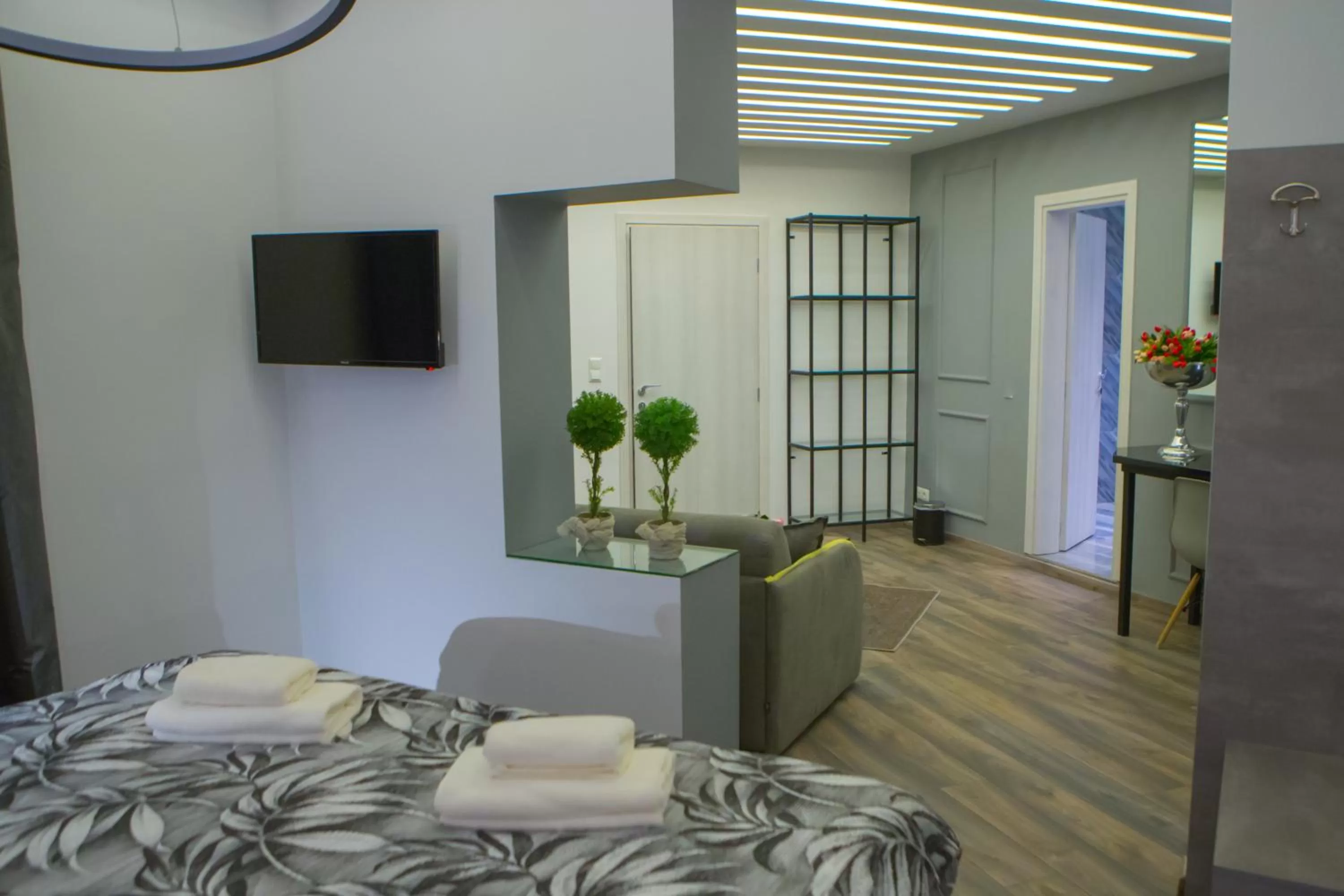 Seating area, Bed in Pantelidis Hotel & Spa