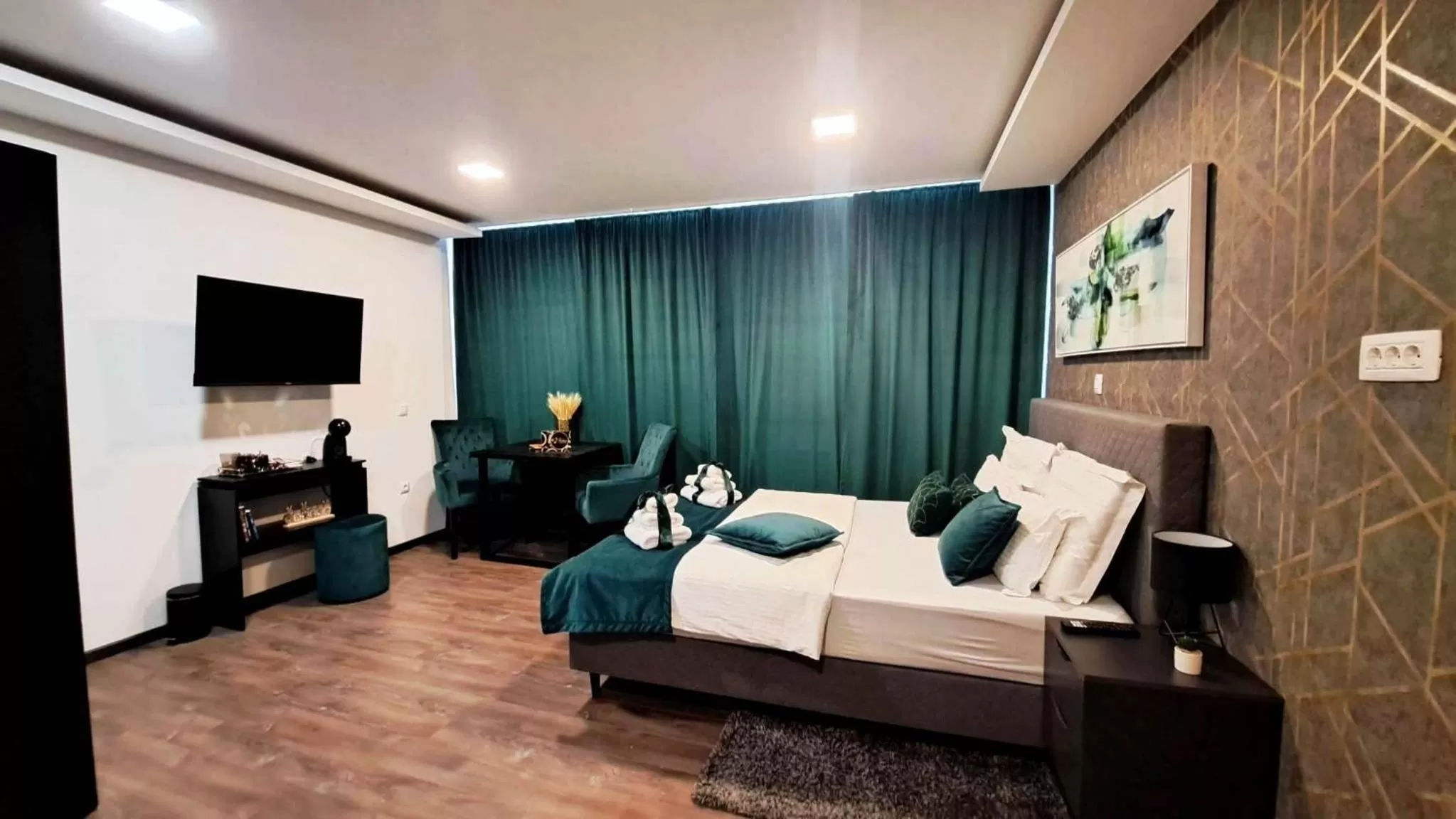 Bed in Arcobaleno Apartments & Rooms