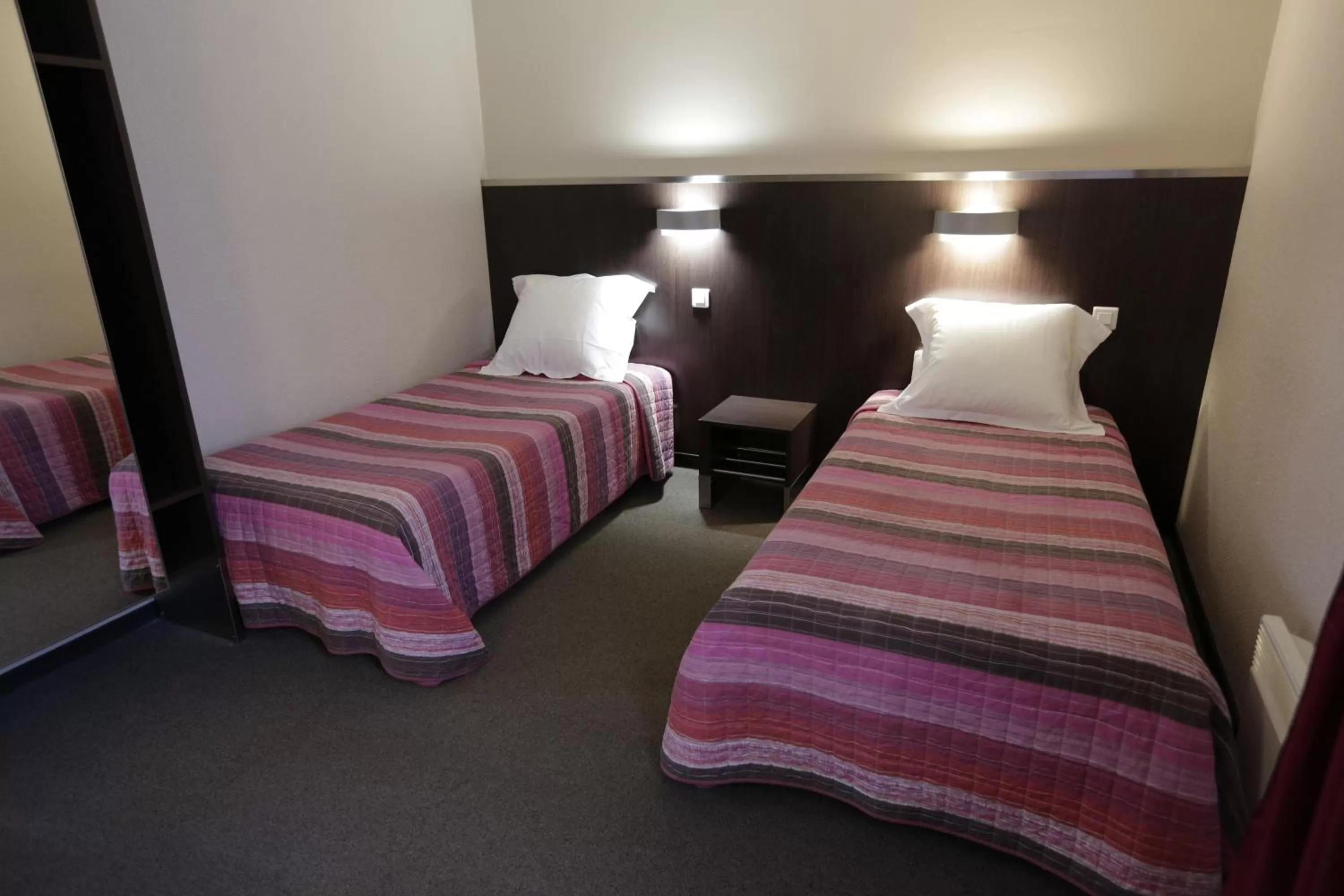 Bedroom, Bed in Hôtel Au Petit Caporal