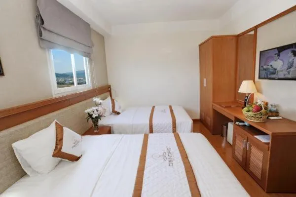 Photo of the whole room, Bed in Dendro beachfront Hotel