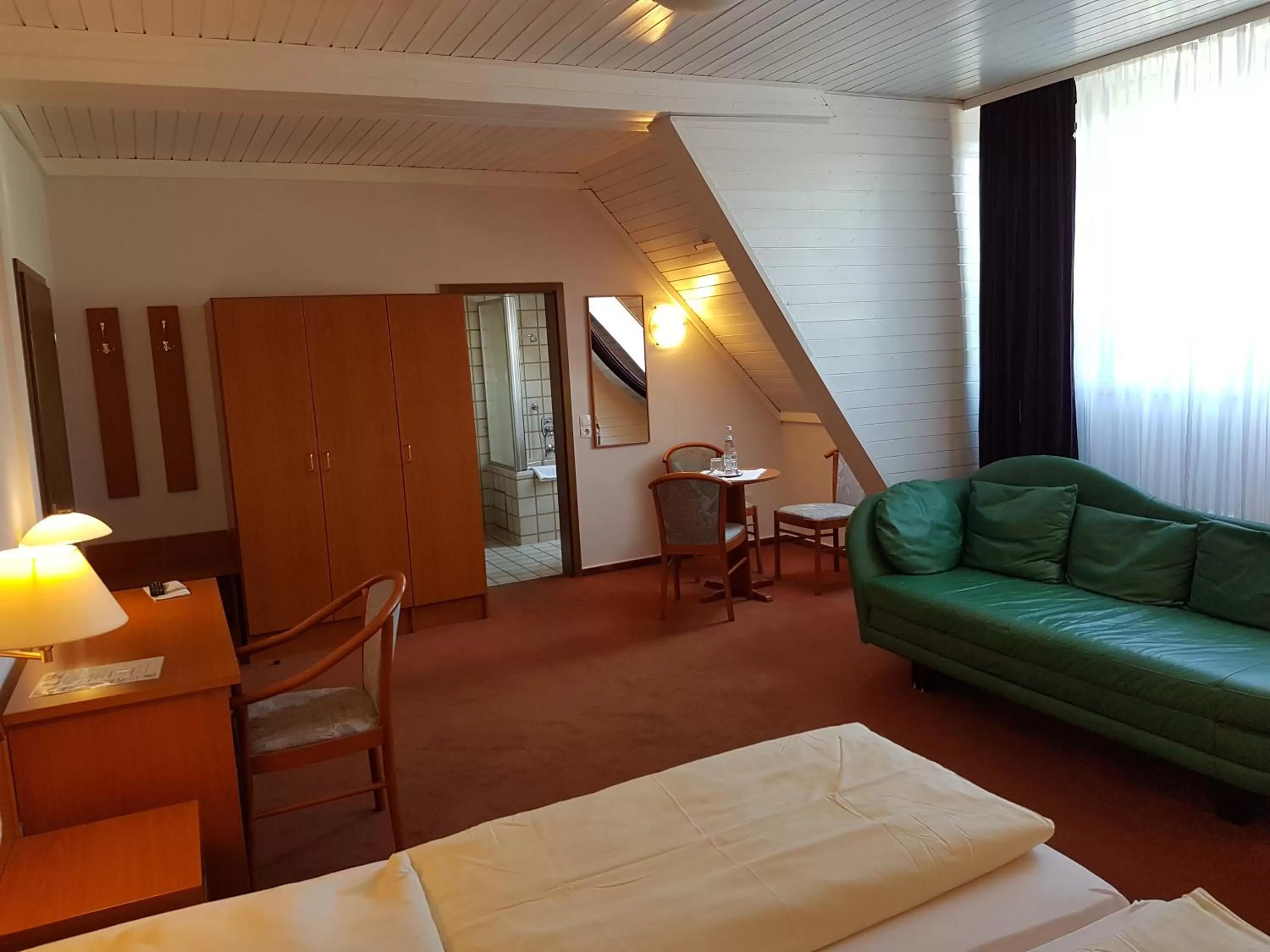 Seating area, Bed in Hotel Restaurant Klostermühle