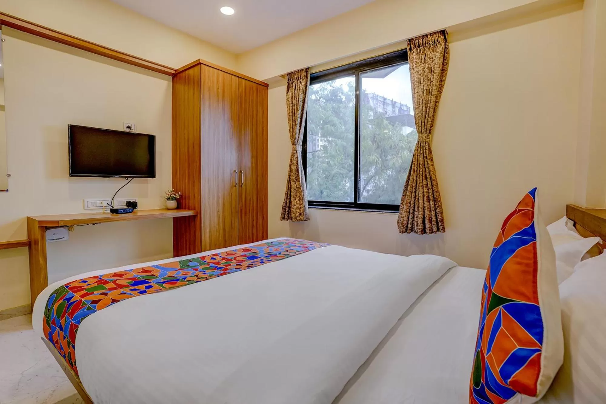 Bed in FabHotel Crystal Homes - nr Rajaram Bhiku stadium