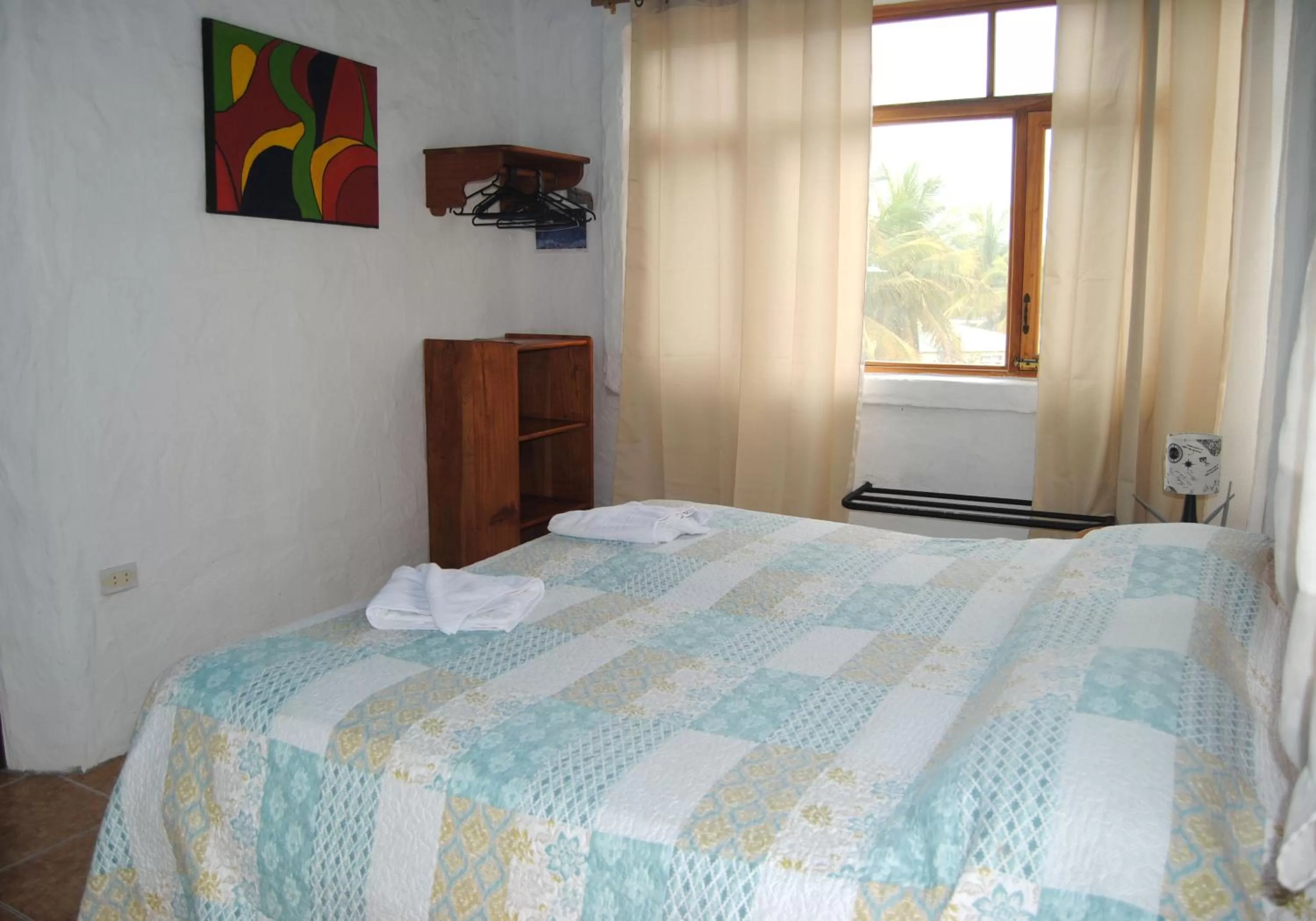 Bedroom, Bed in Hostal Galapagos by Bar de Beto