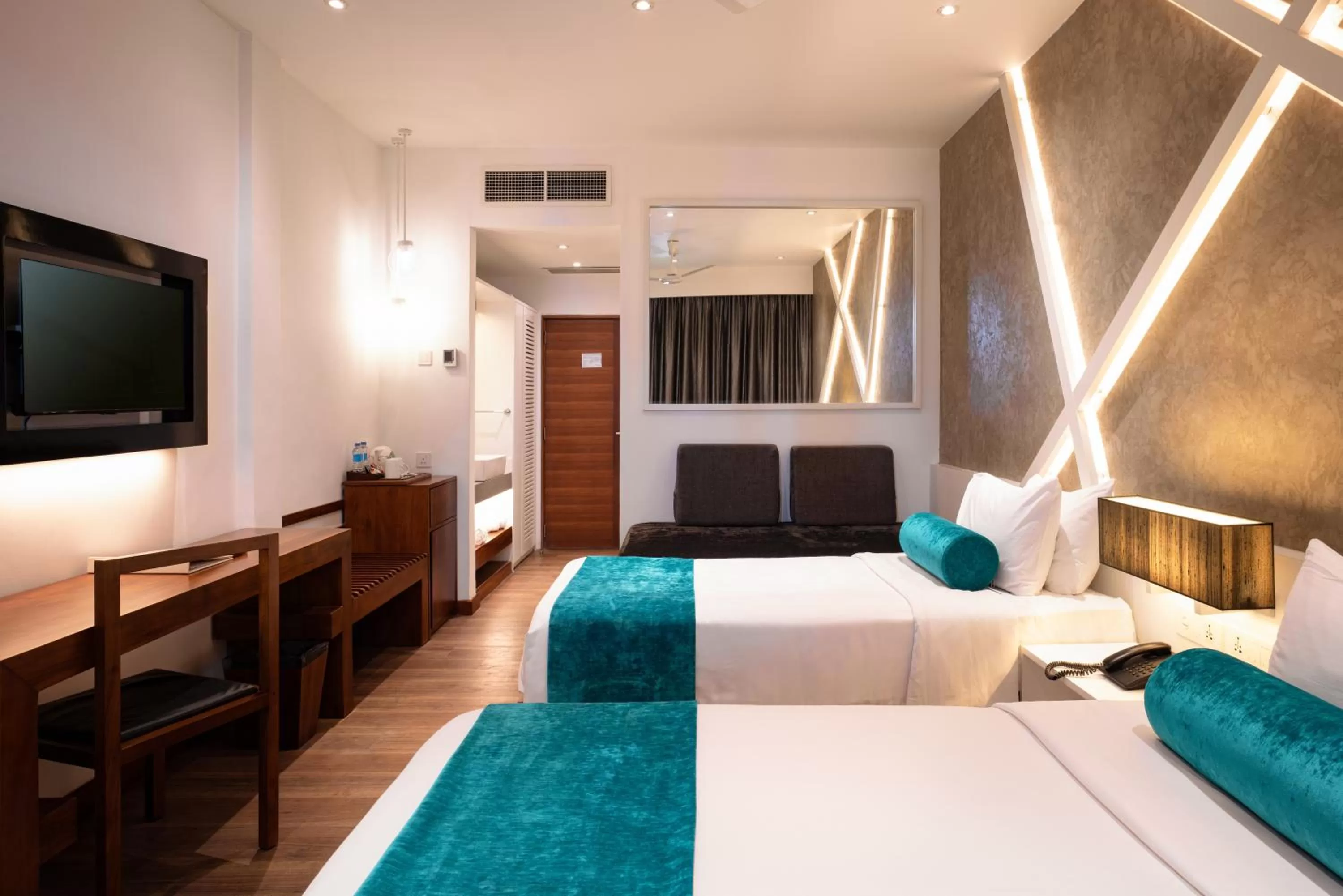 Bed in Camelot Beach Hotel