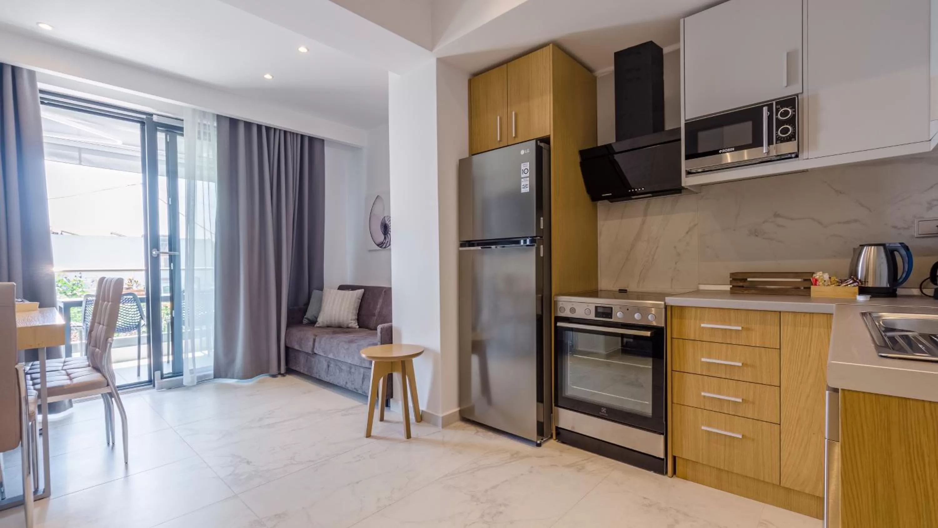Kitchen or kitchenette in Kima Premium Apartments