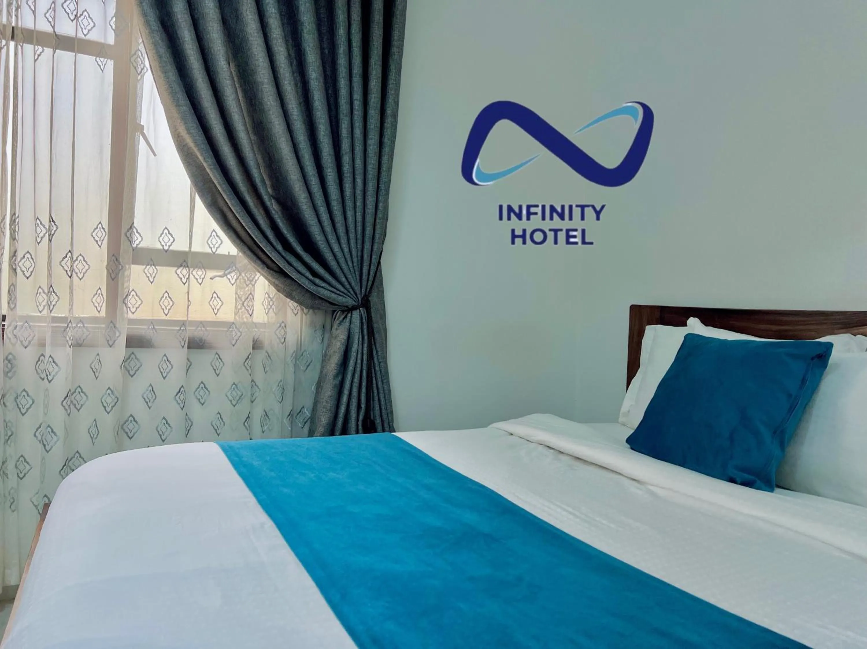 Bedroom, Bed in Infinity Hotel Kampala