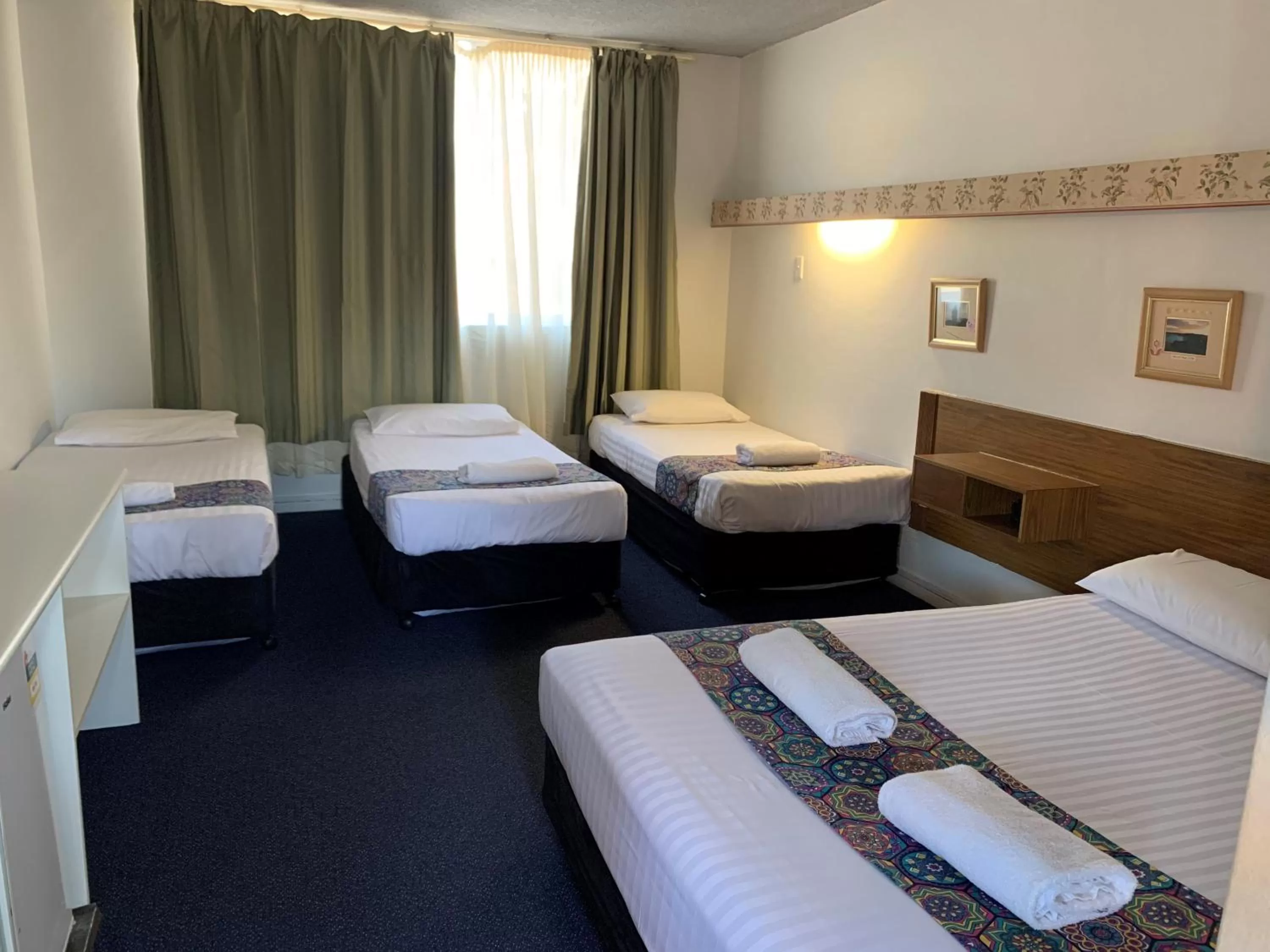 Bed in Panorama Motor Inn