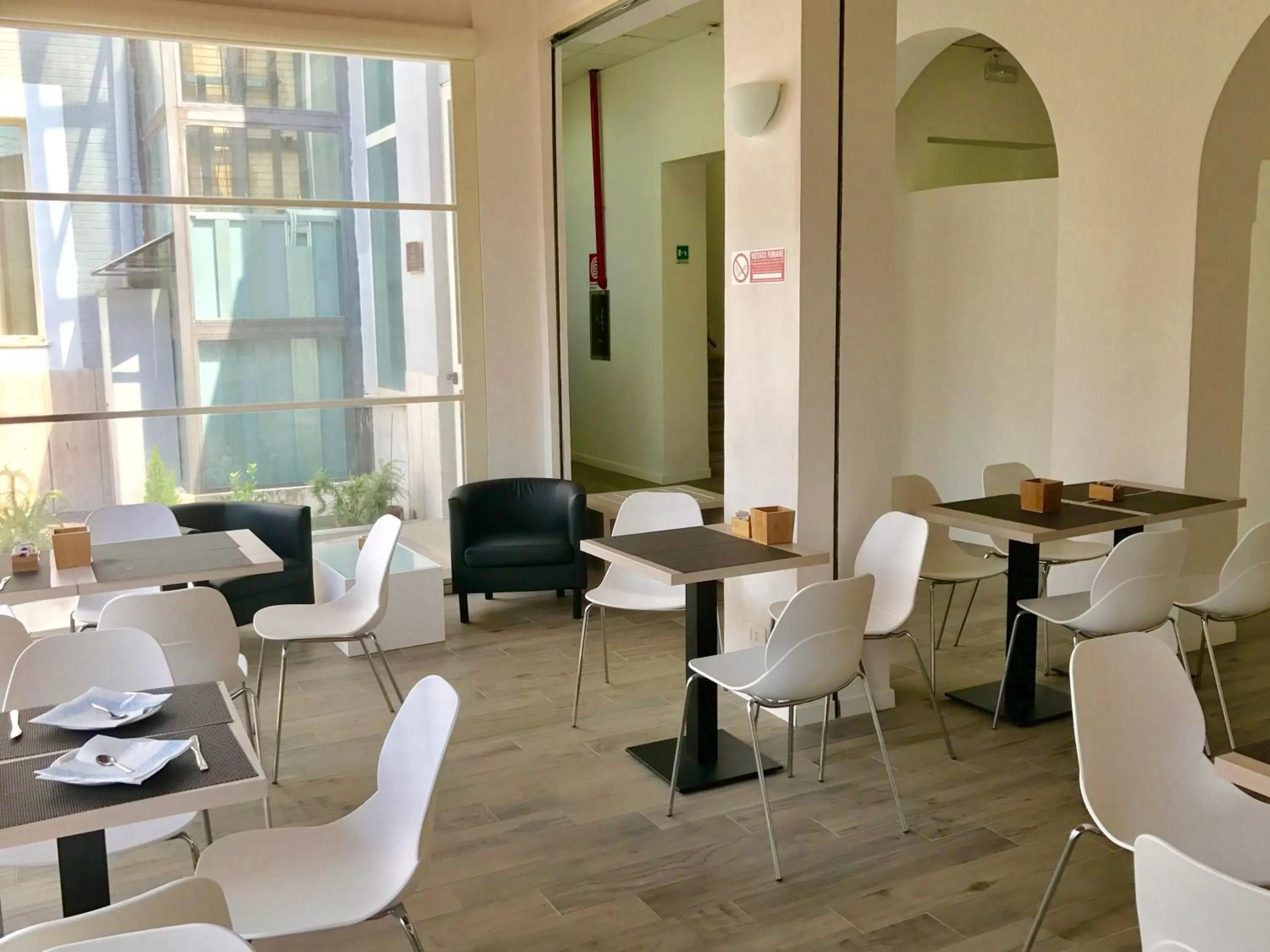 Communal lounge/ TV room in Academy Hotel